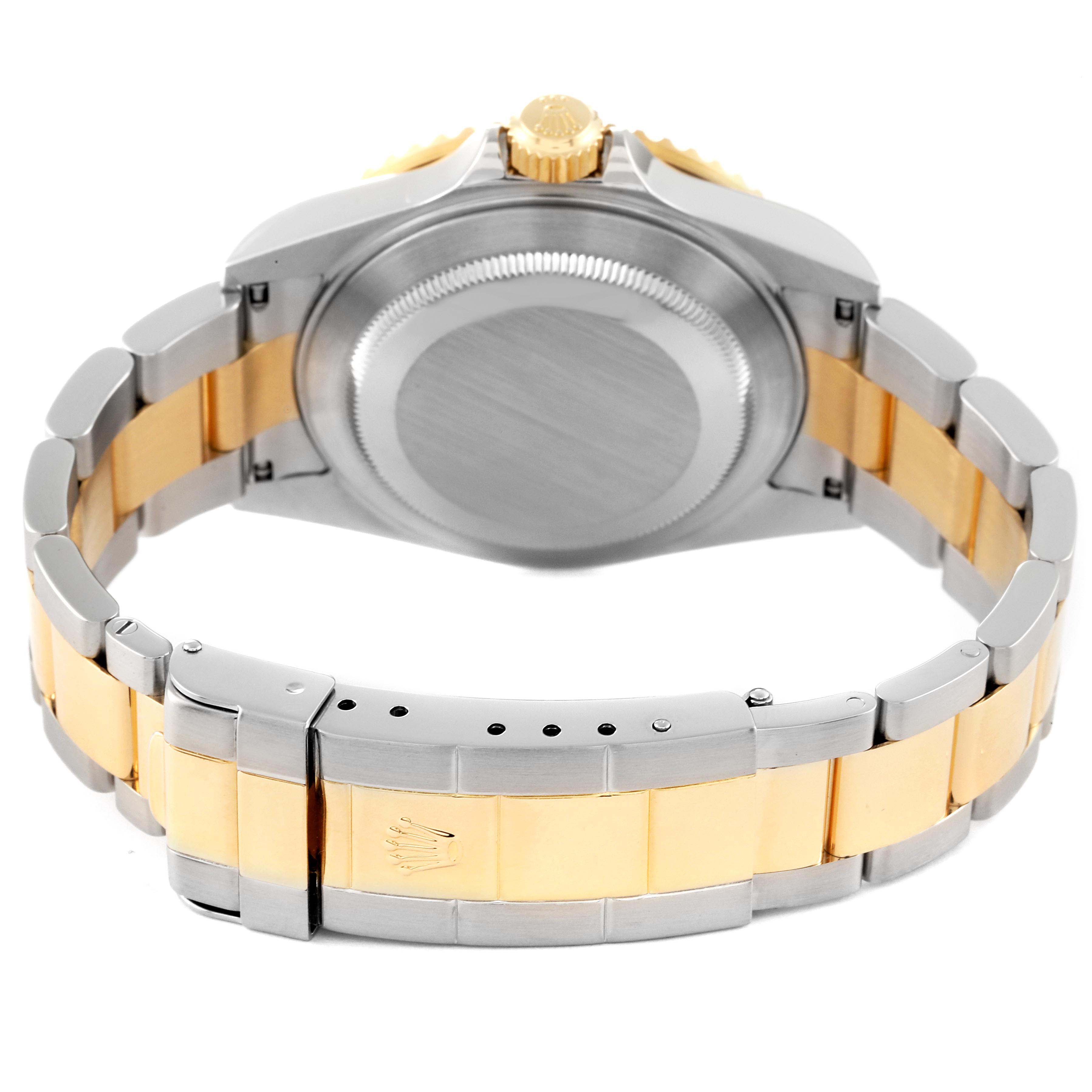 This image shows the back case and bracelet of a Rolex Submariner 16613 Men's Steel and Gold (two tone) Blue Dial 16613 Men's Steel and Gold (two tone) Blue Dial watch, focusing on the clasp and crown.