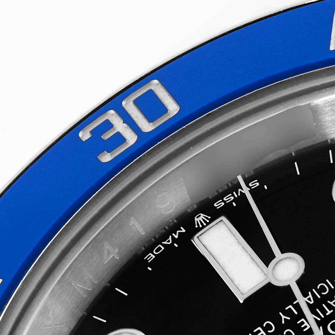 This image shows a close-up of the bezel and part of the dial of a Rolex Submariner 126619 Men's White Gold Black Dial 126619 Men's White Gold Black Dial watch.