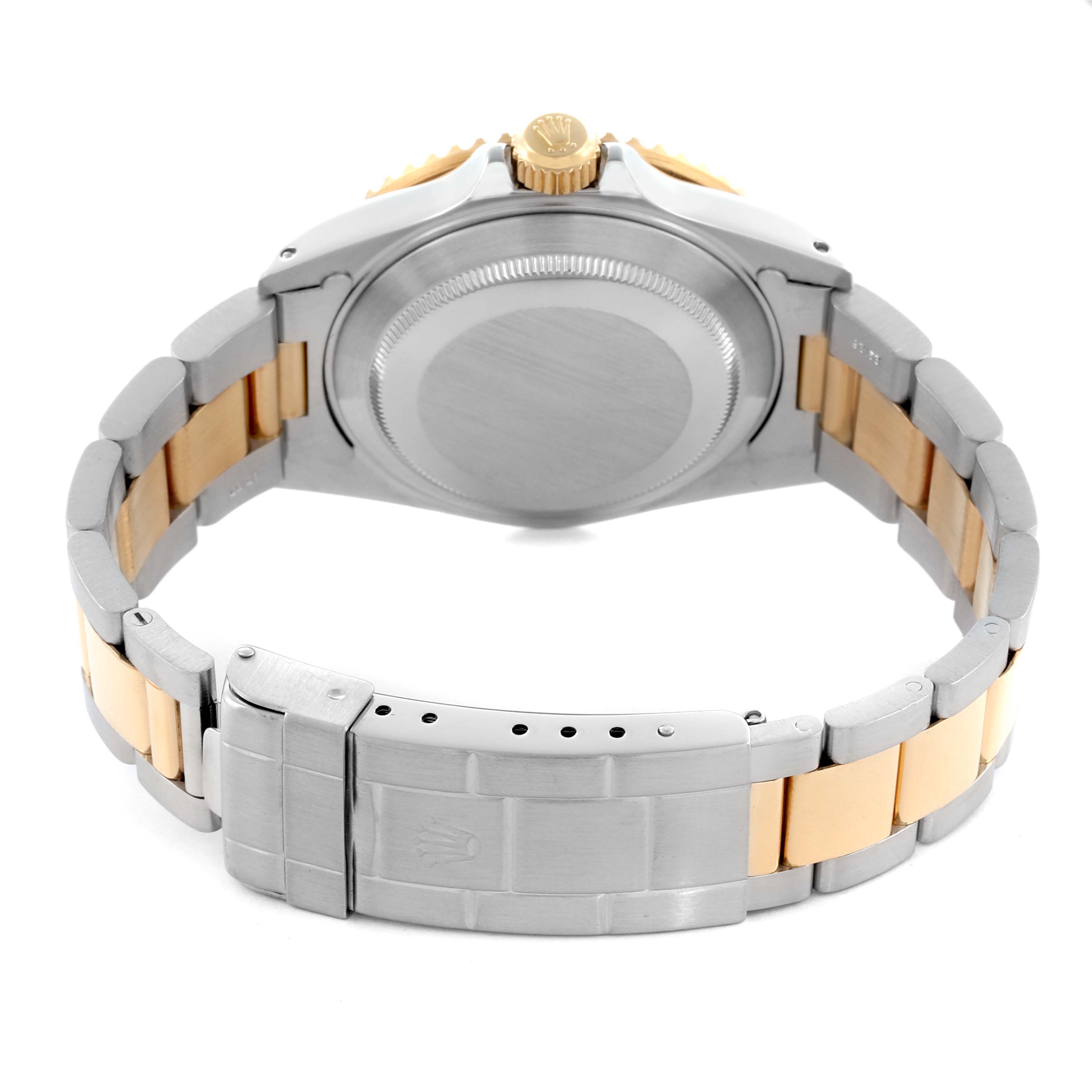 The Rolex Submariner 16613 Men's Steel and Gold (two tone) Black Dial 16613 Men's Steel and Gold (two tone) Black Dial is shown from the back, highlighting the case back, crown, and two-tone bracelet.