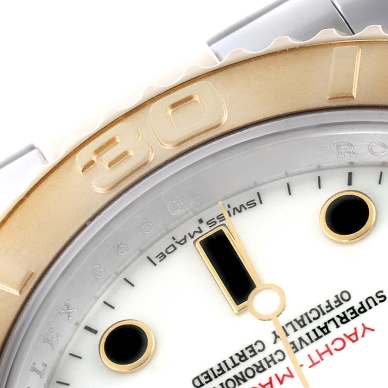The image shows a close-up of the bezel and part of the dial on the Rolex Yacht-Master 66270 Men's Steel and Gold (two tone) White Dial 66270 Men's Steel and Gold (two tone) White Dial watch.