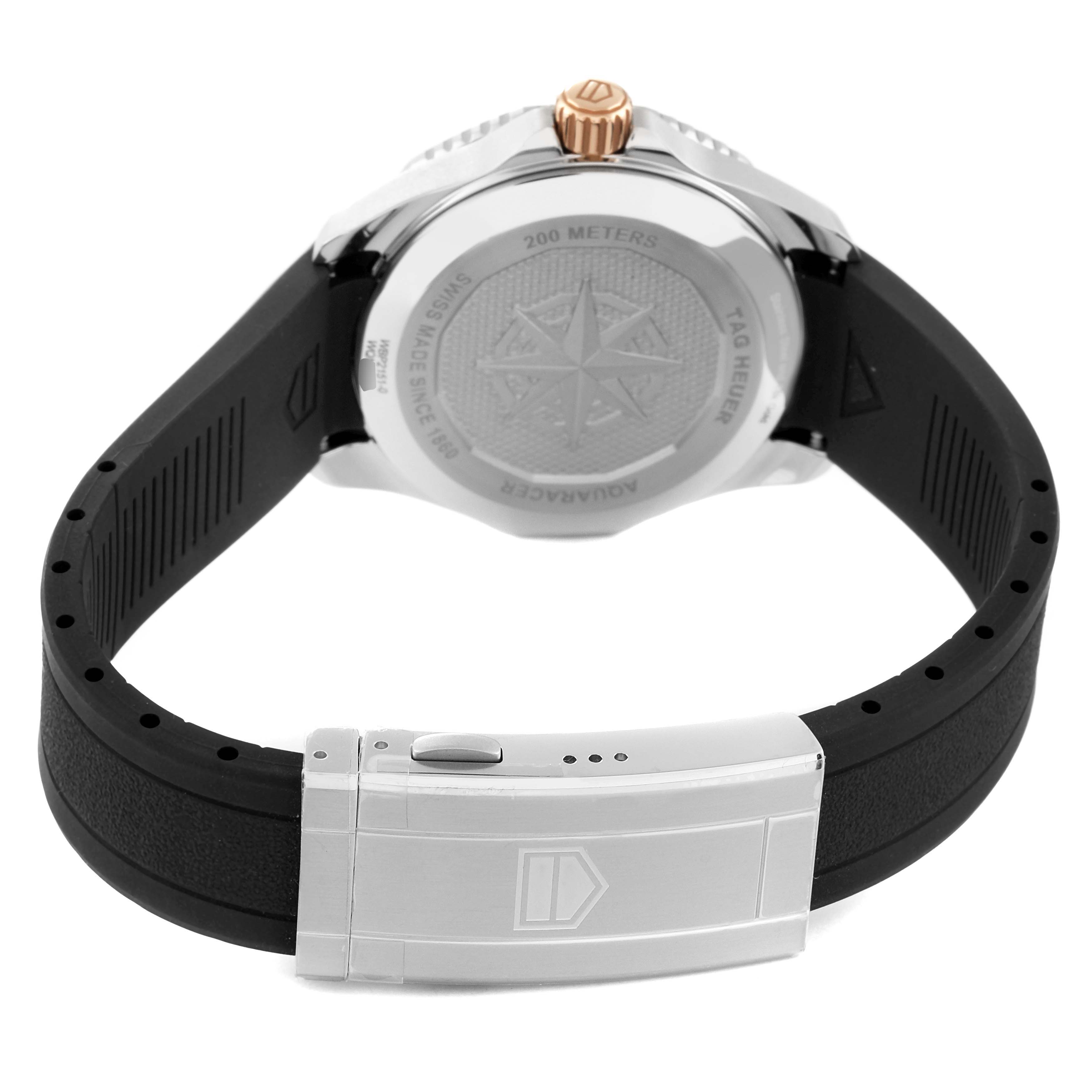 The image shows the back view of a Tag Heuer Aquaracer WBP2151.FT6199 Men's Steel and Gold (two tone) Black Dial WBP2151.FT6199 Men's Steel and Gold (two tone) Black Dial watch, highlighting the case back, strap, and deployment clasp.