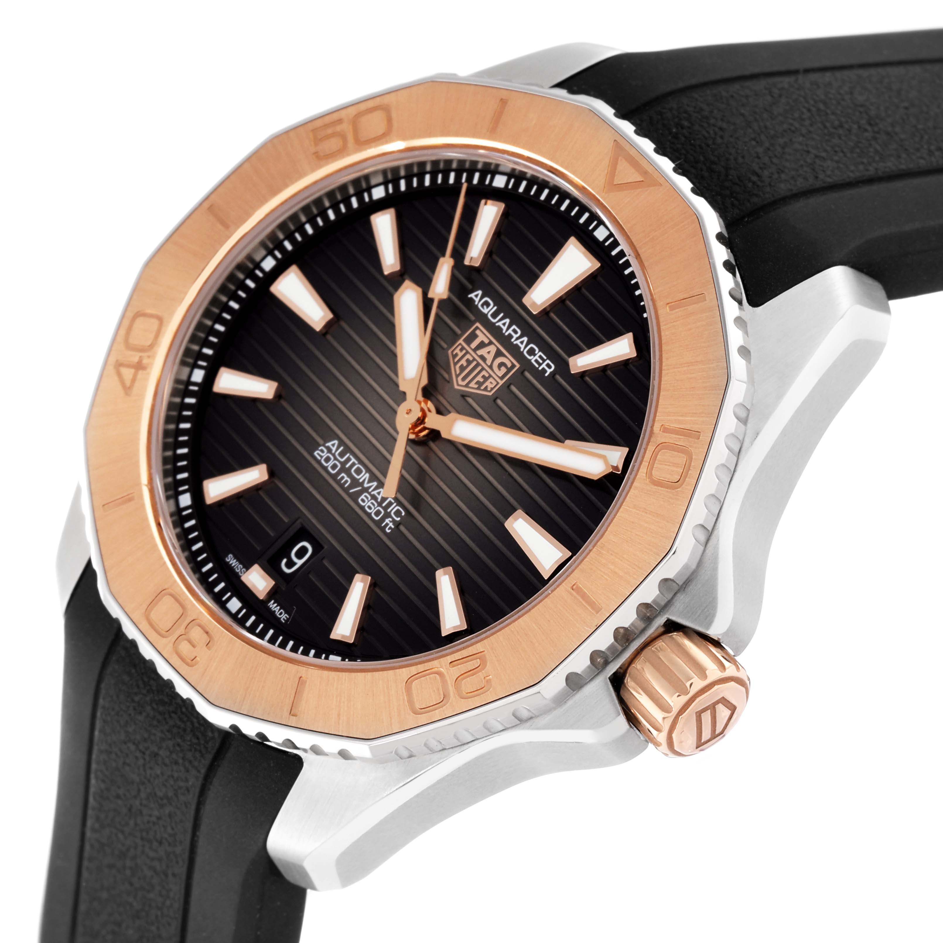 The image shows a close-up angle of a Tag Heuer Aquaracer WBP2151.FT6199 Men's Steel and Gold (two tone) Black Dial WBP2151.FT6199 Men's Steel and Gold (two tone) Black Dial watch, highlighting the dial, bezel, crown, and a part of the strap.