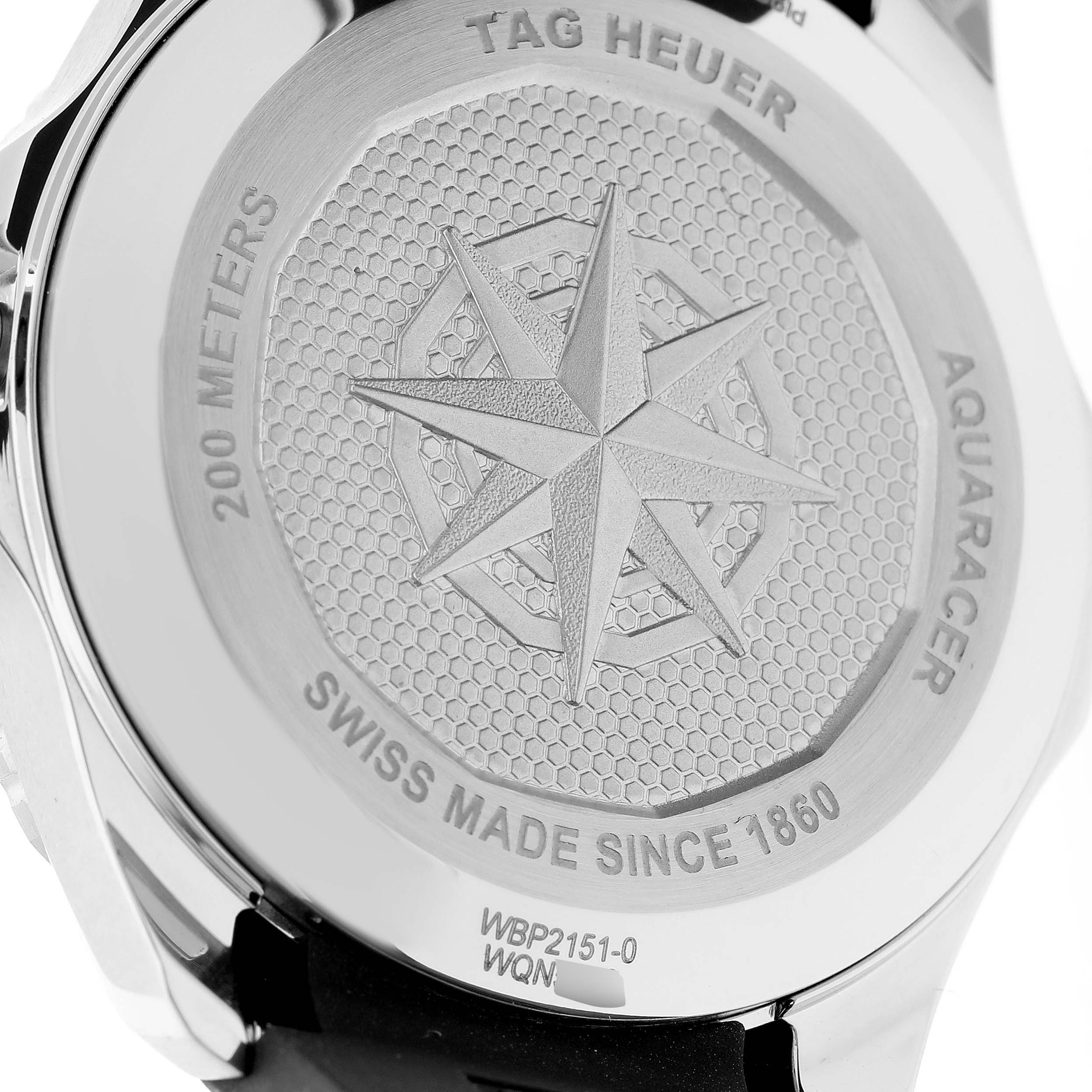 The image shows the back of a Tag Heuer Aquaracer WBP2151.FT6199 Men's Steel and Gold (two tone) Black Dial WBP2151.FT6199 Men's Steel and Gold (two tone) Black Dial watch, highlighting the engravings and water resistance details.