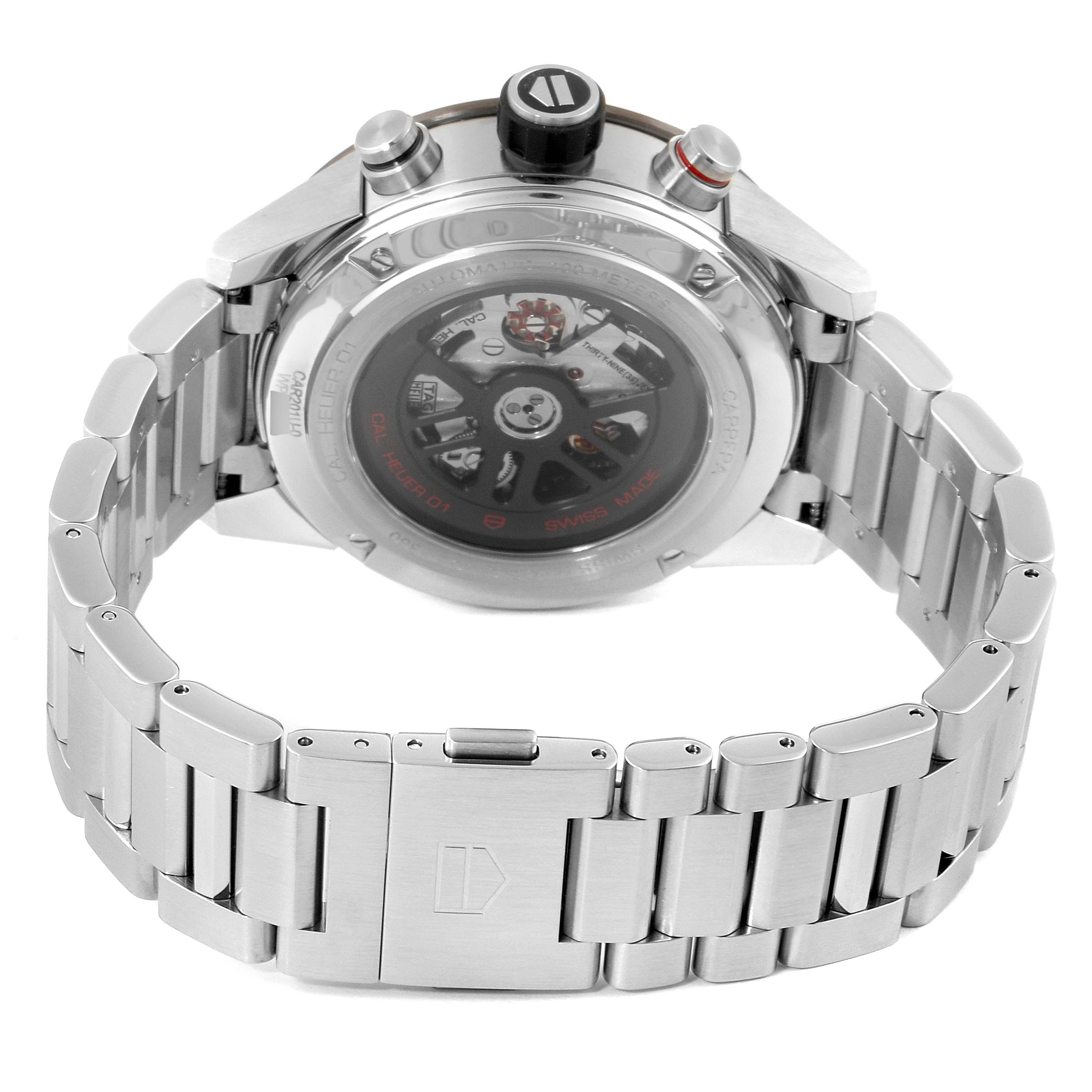 The image shows the back view of a Tag Heuer Carrera CAR201U.BA0766 Men's Stainless Steel Brown Dial CAR201U.BA0766 Men's Stainless Steel Brown Dial watch with its metal bracelet and transparent case back.