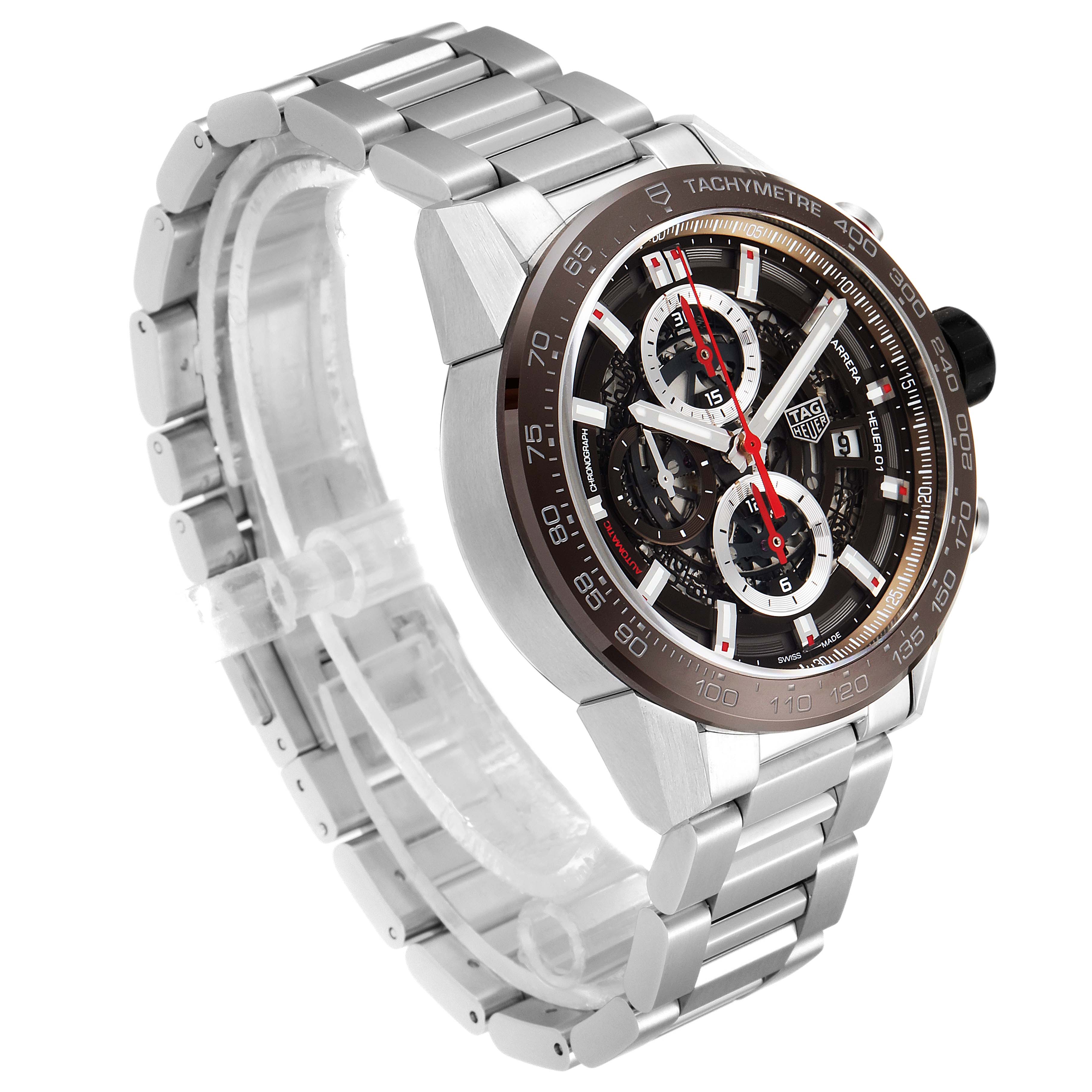 The image shows a side angle of the Tag Heuer Carrera CAR201U.BA0766 Men's Stainless Steel Brown Dial CAR201U.BA0766 Men's Stainless Steel Brown Dial watch, highlighting its dial, tachymeter bezel, and stainless steel bracelet.