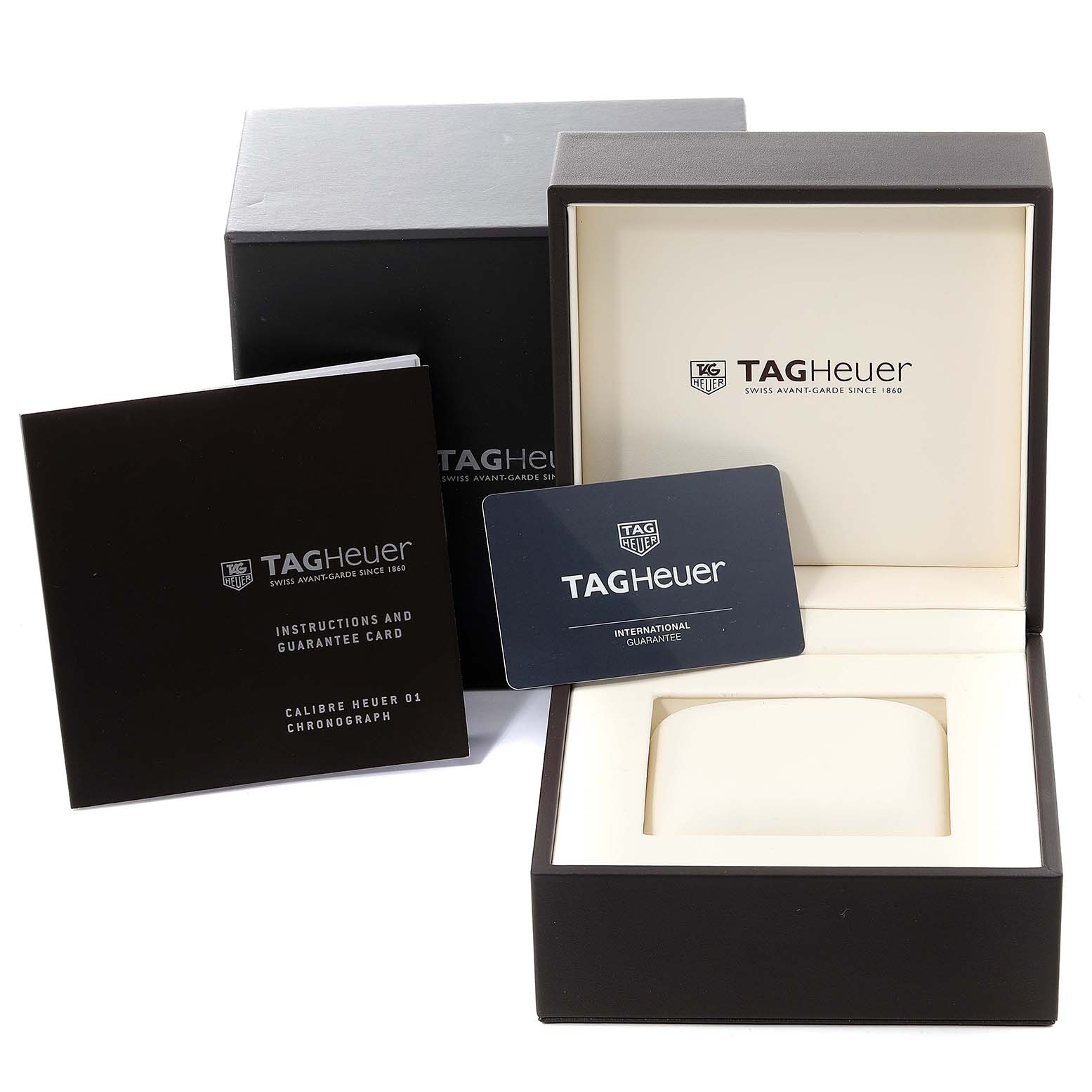 The image shows the packaging, instruction manual, guarantee card, and display box of a Tag Heuer Carrera CAR201U.BA0766 Men's Stainless Steel Brown Dial CAR201U.BA0766 Men's Stainless Steel Brown Dial model watch.