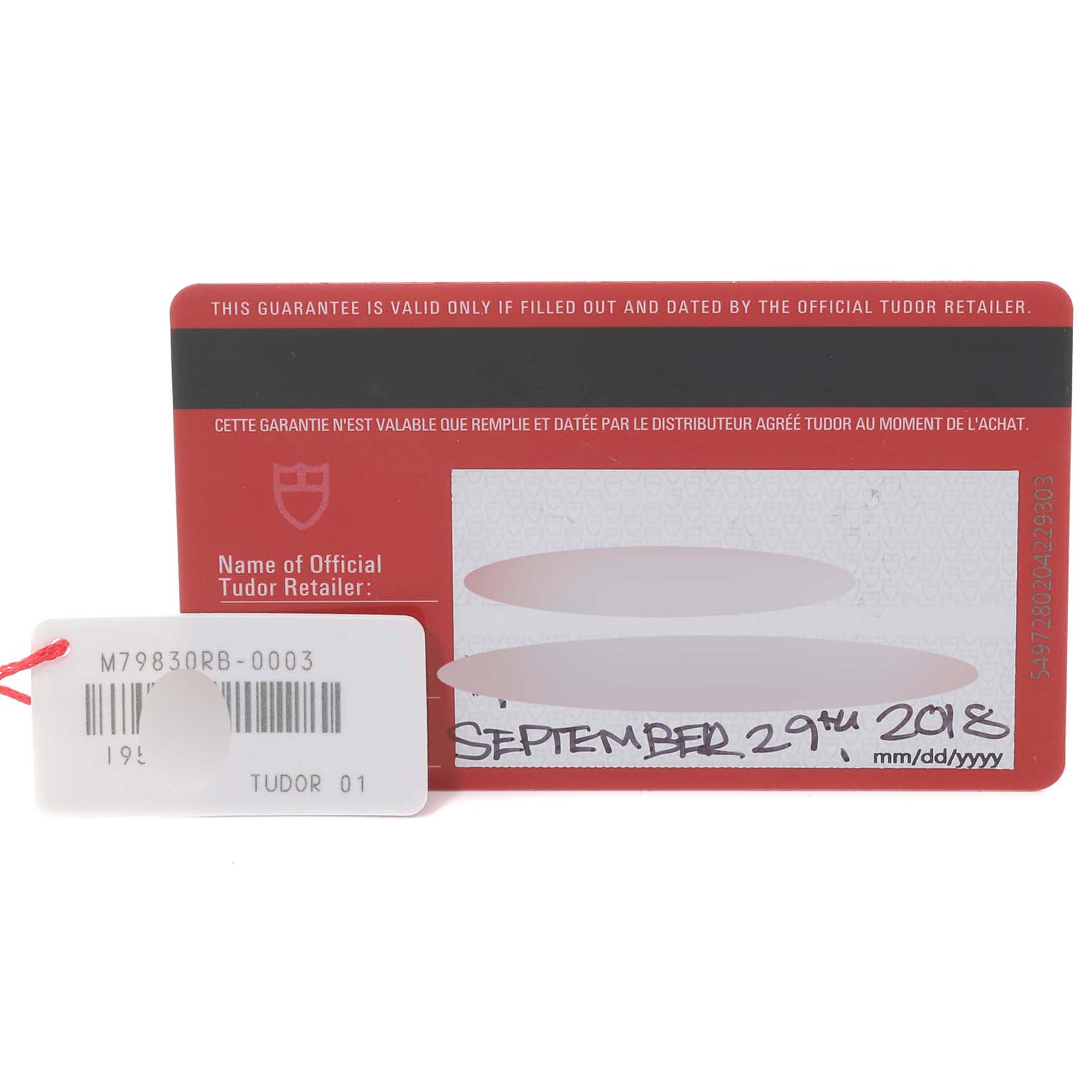 The image shows the warranty card and a tag for the Tudor Heritage Black Bay 79830RB Men
s Stainless Steel Black Dial 79830RB Men
s Stainless Steel Black Dial watch model.