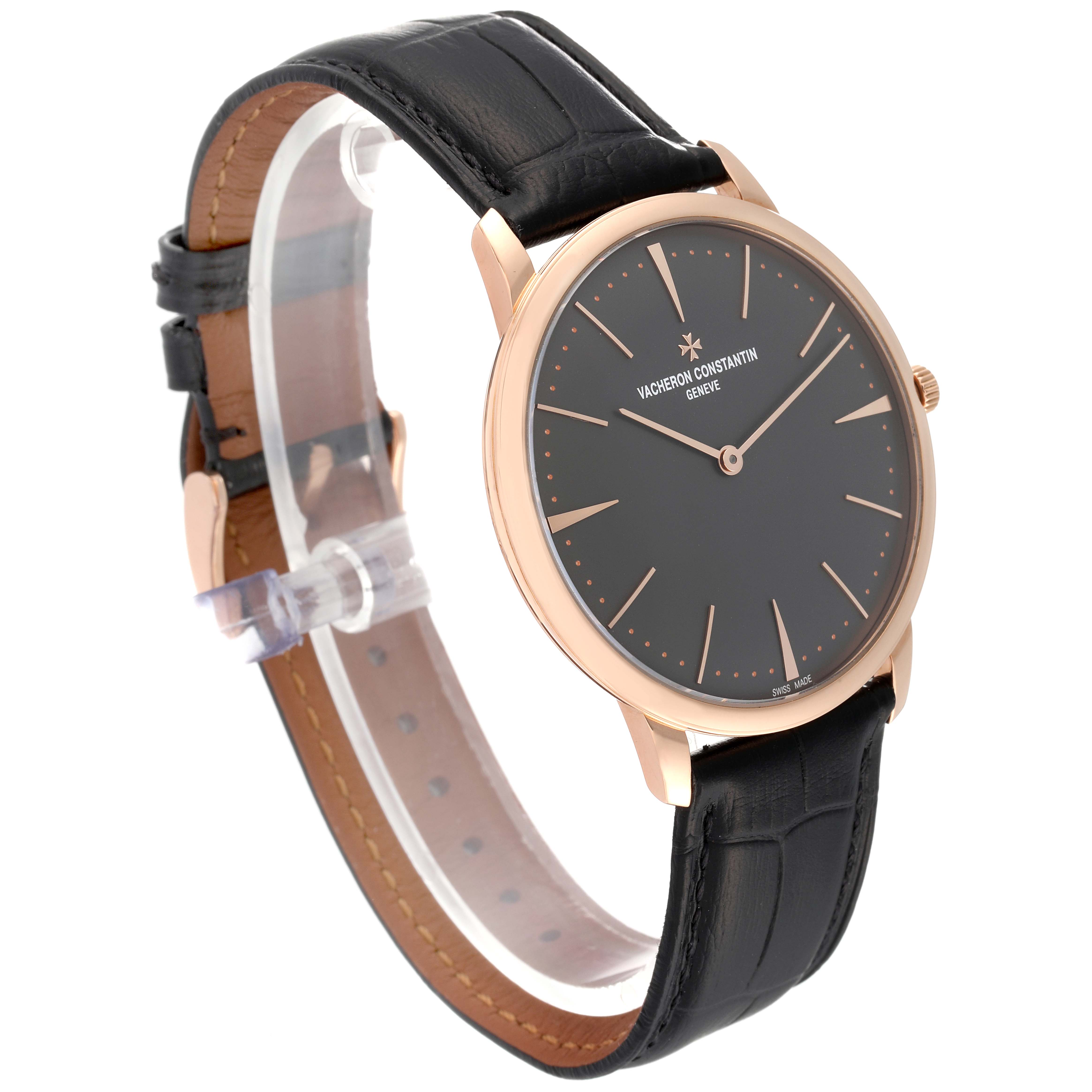 The image shows a front-right angled view of the Vacheron Constantin Patrimony 81180 Men's Rose Gold Grey Dial 81180 Men's Rose Gold Grey Dial watch, highlighting its black dial and leather strap.
