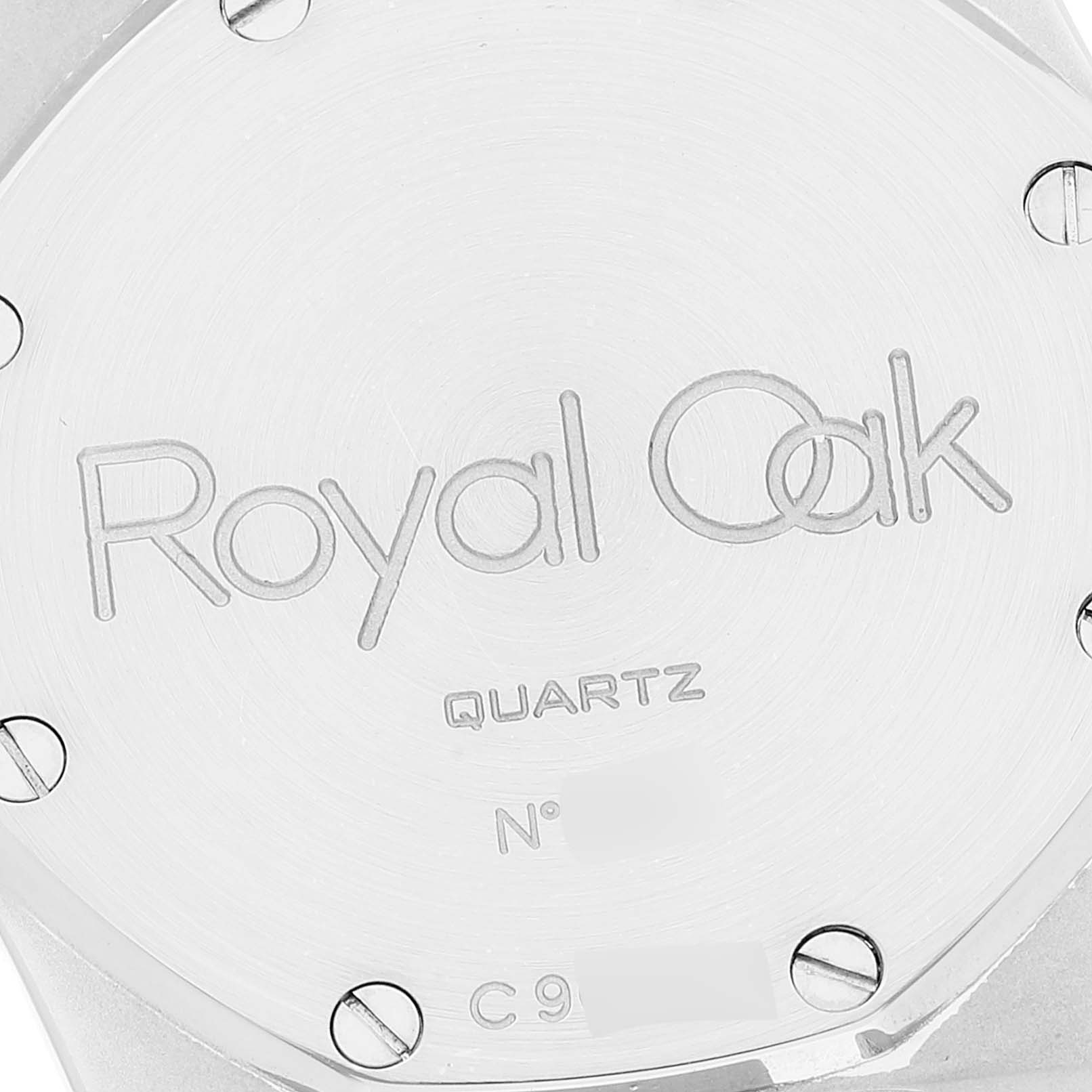 This image shows the case back of an Audemars Piguet Royal Oak 56271ST Men's Stainless Steel Black Dial 56271ST Men's Stainless Steel Black Dial watch, highlighting the "Royal Oak" engraving and serial number.