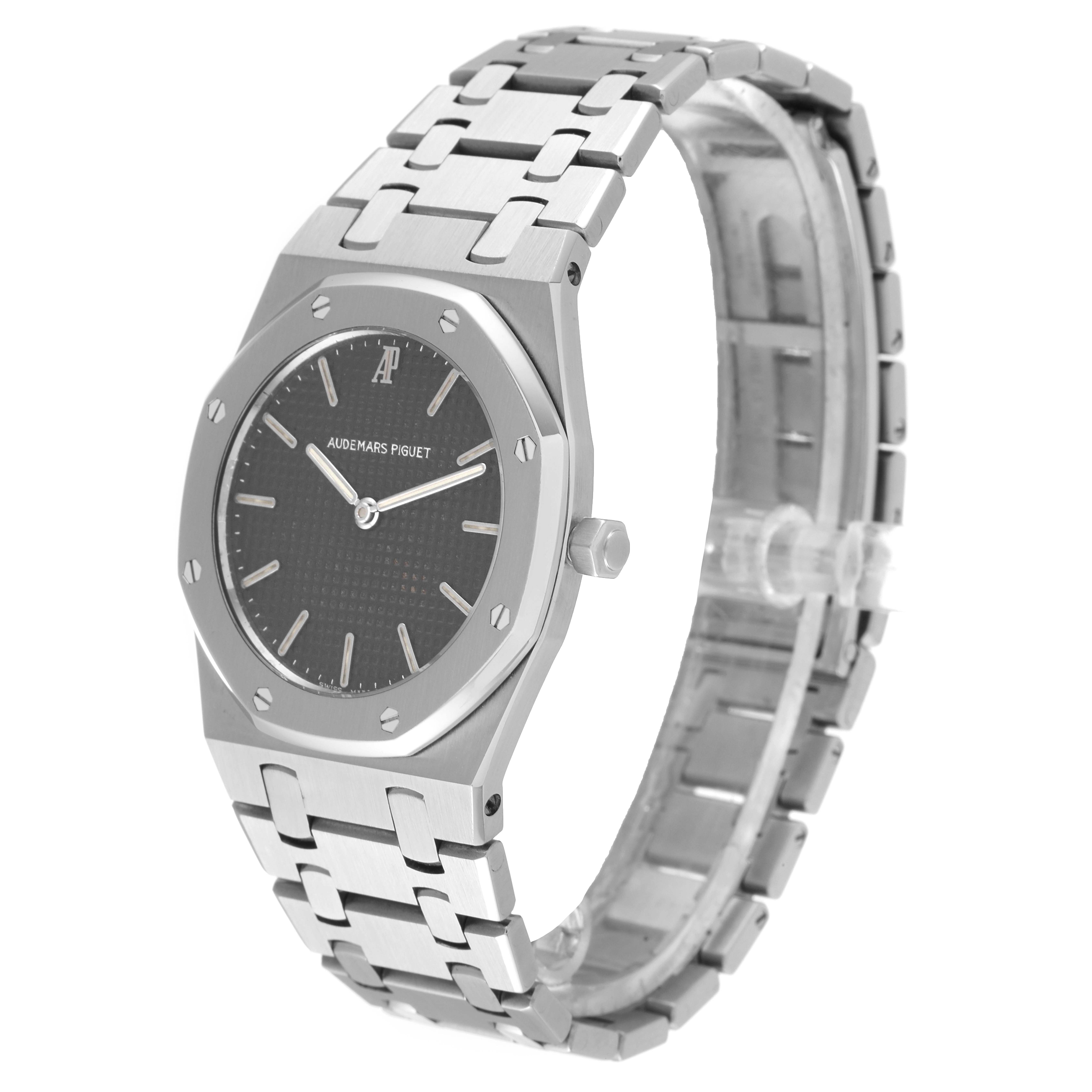 This image shows a side and top view of an Audemars Piguet Royal Oak 56271ST Men's Stainless Steel Black Dial 56271ST Men's Stainless Steel Black Dial watch, highlighting its bracelet, dial, and bezel.