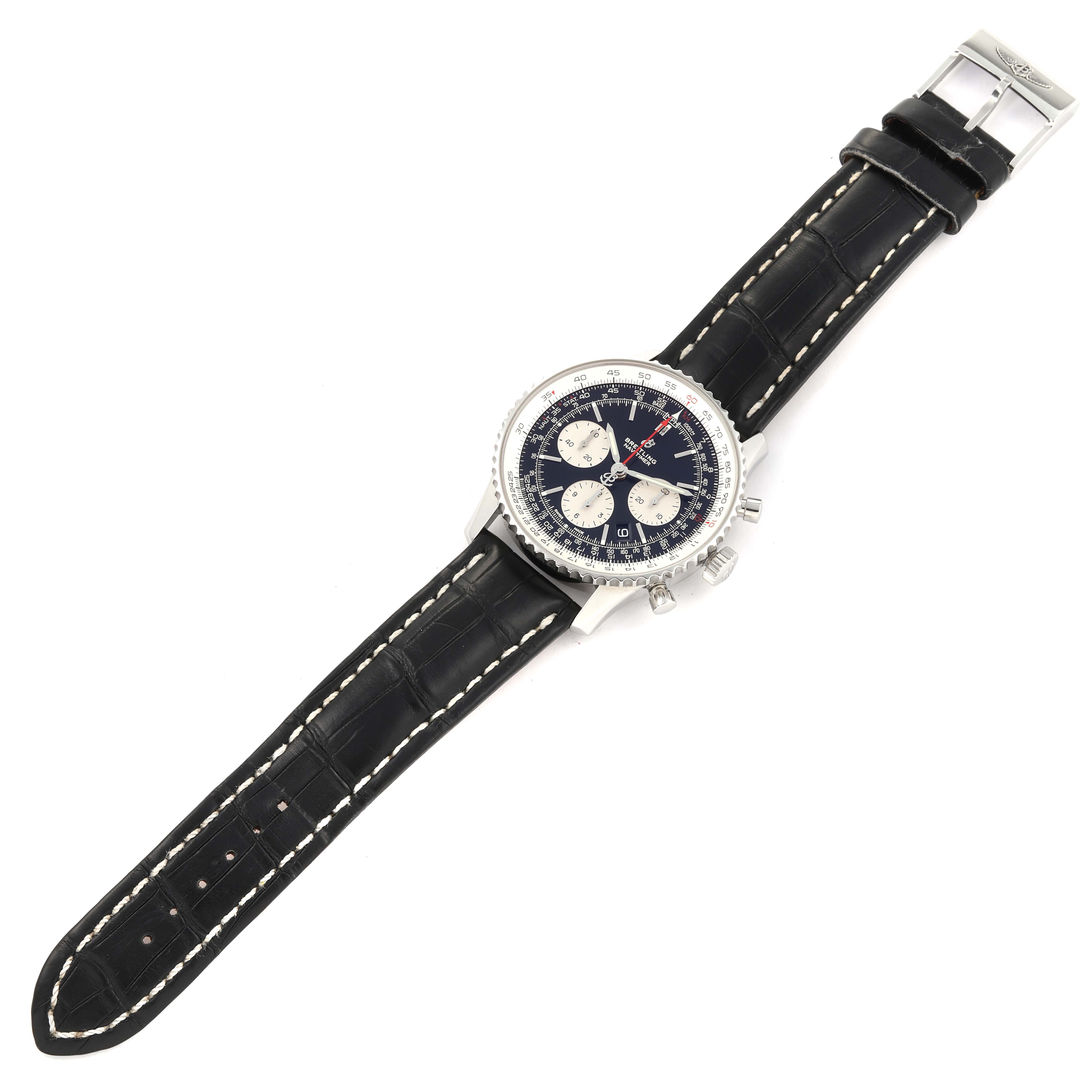 This image shows the Breitling Navitimer AB0121 Men's Stainless Steel Black Dial AB0121 Men's Stainless Steel Black Dial watch laid flat, displaying the black leather strap, watch face, and metal clasp.