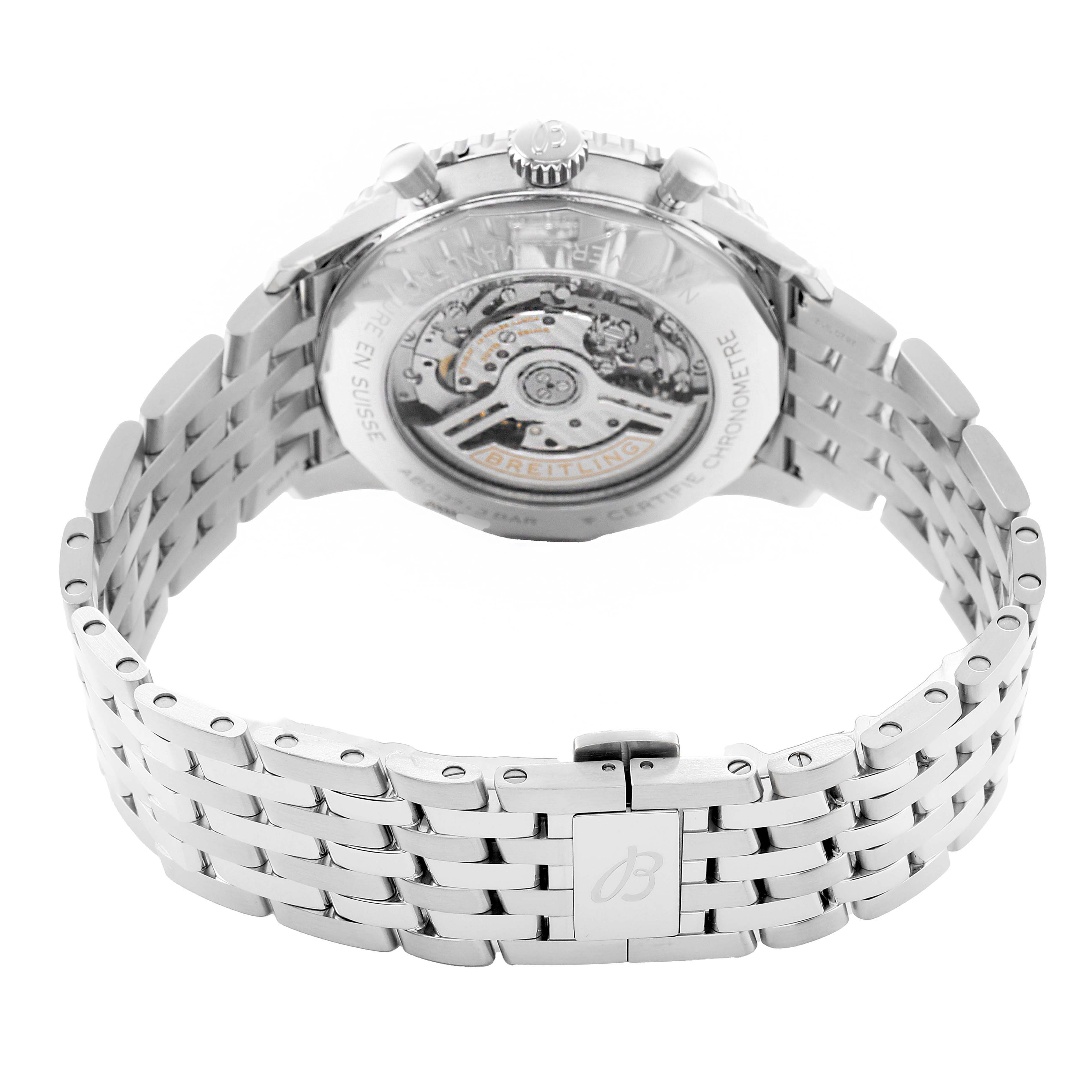 The Breitling Navitimer AB0137 Men's Stainless Steel Blue Dial is shown from the back, highlighting its exposed movement and metal bracelet with a clasp.