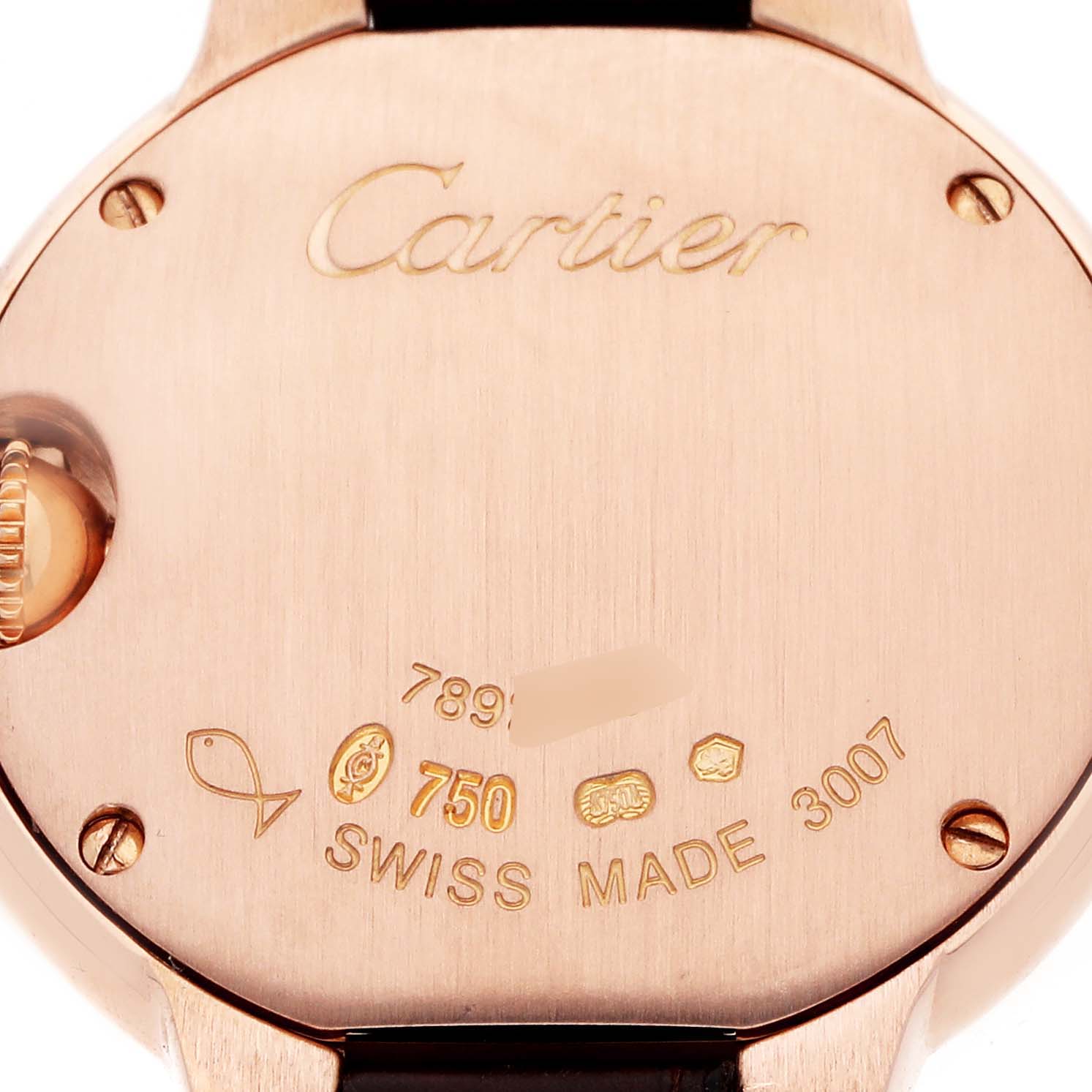 The image shows the back case of a Cartier Ballon Bleu W6900256 Women's Rose Gold Silver Dial watch, highlighting engravings and the winding crown on the left.