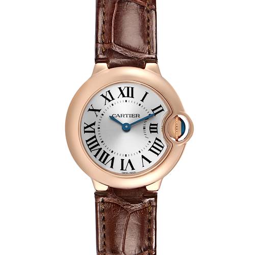 The Ballon Bleu by Cartier watch is shown from the front, highlighting its round face, Roman numerals, and brown leather strap.