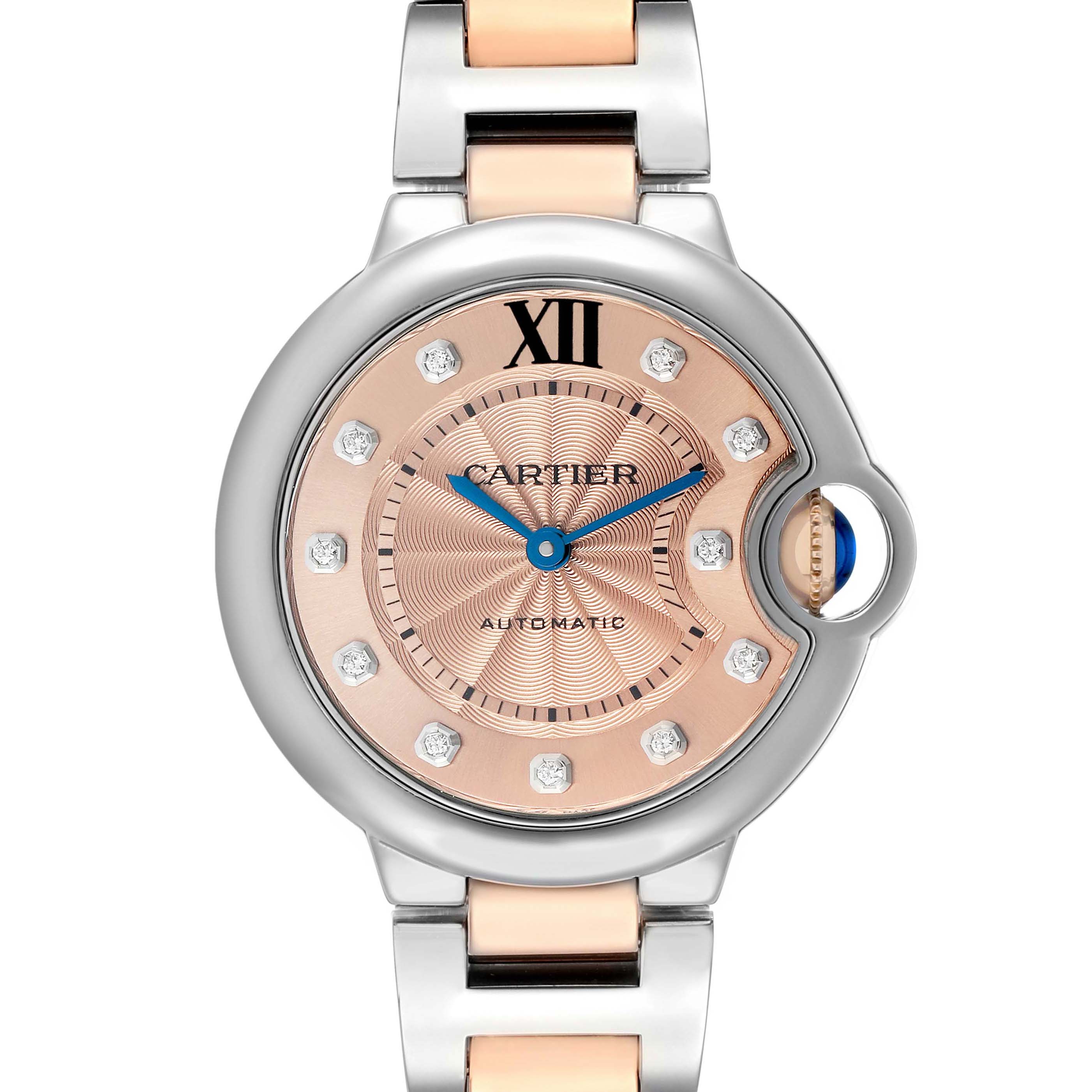 The Cartier Ballon Bleu WE902053 Women's Steel and Gold (two tone) Pink Dial watch is shown from a front angle, highlighting its dial, case, crown, and part of the bracelet.
