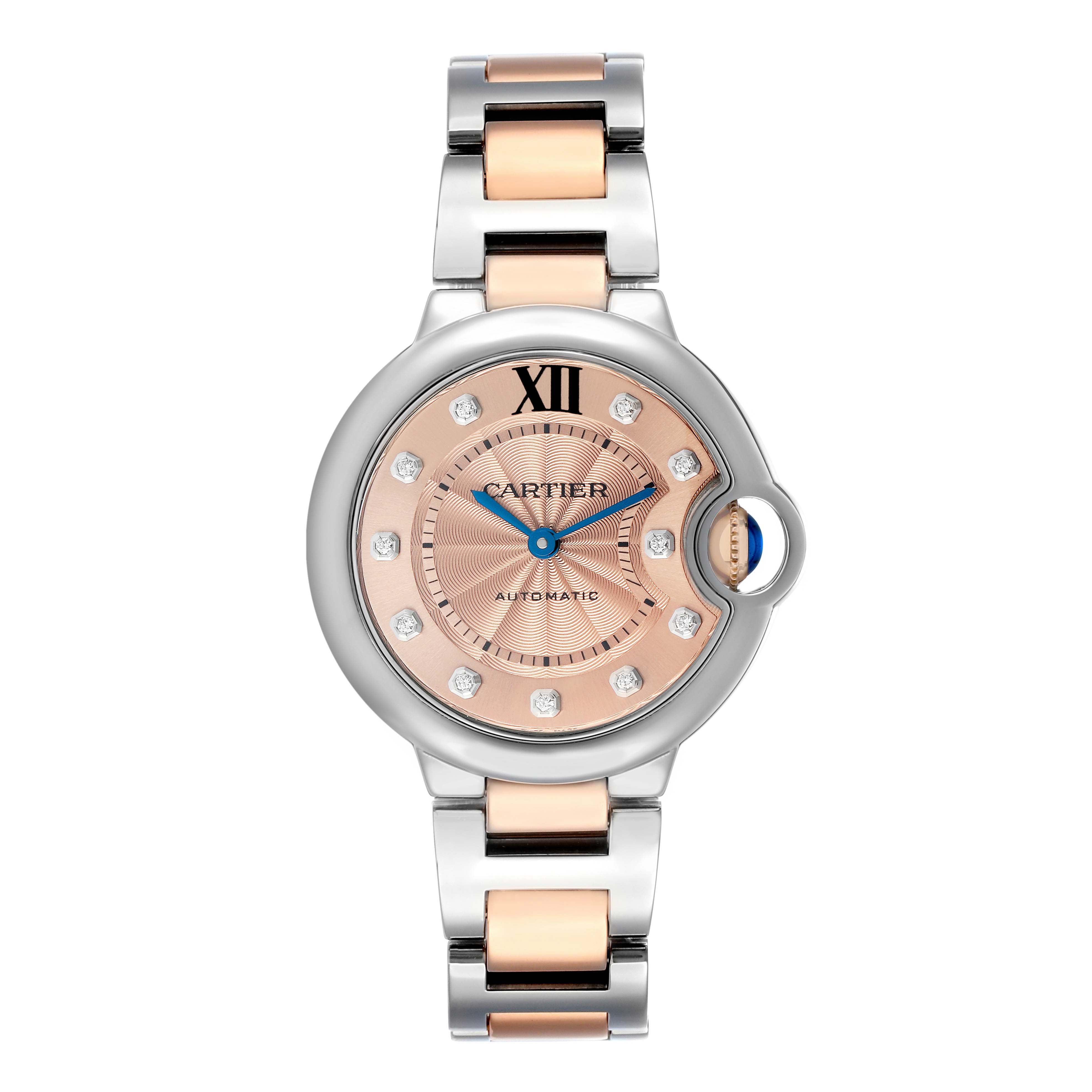 The Cartier Ballon Bleu WE902053 Women's Steel and Gold (two tone) Pink Dial watch is shown from a top-down angle, displaying the face, bezel, and part of the bracelet.