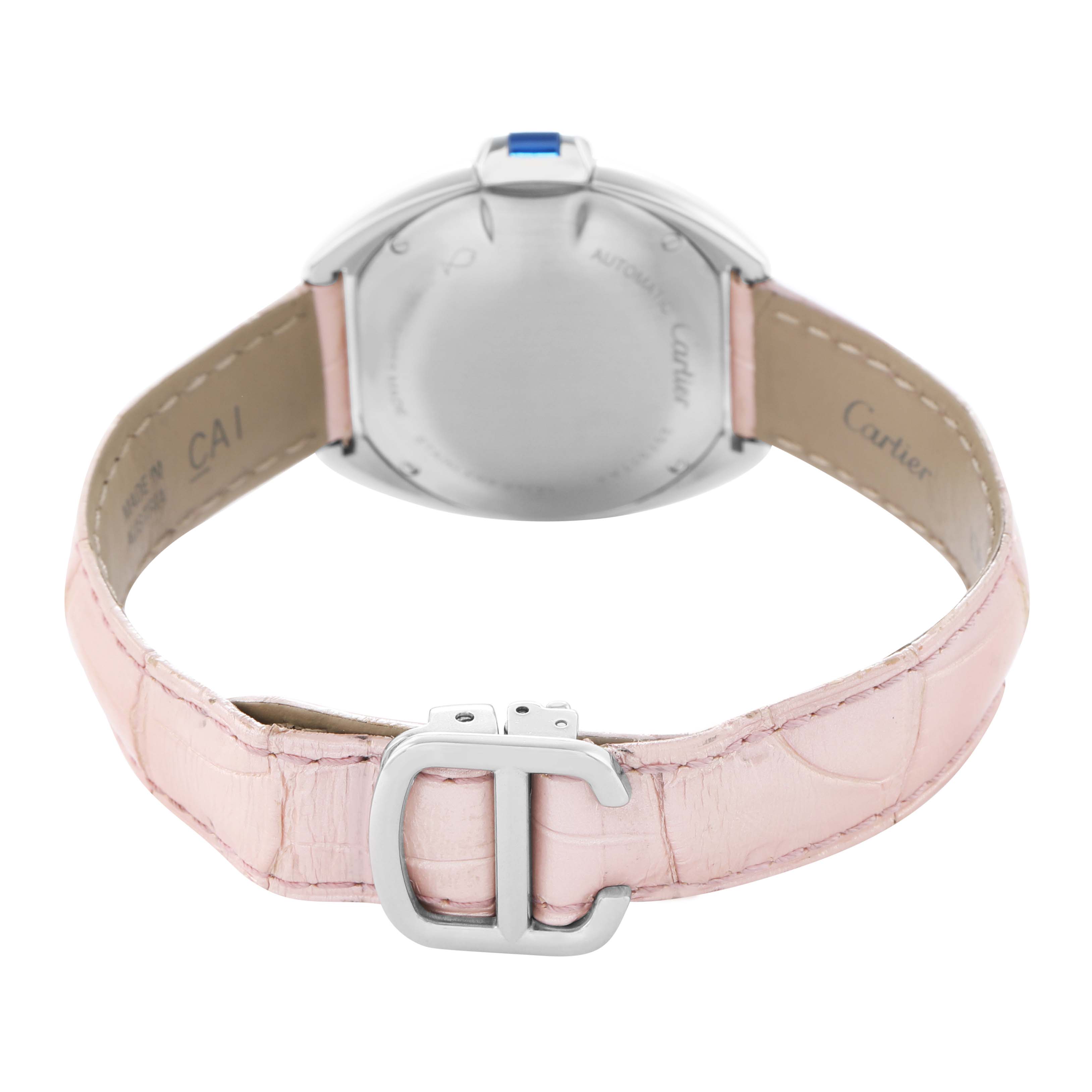 The Cartier Clé watch is shown from the back, displaying its case, pink leather strap, and buckle.