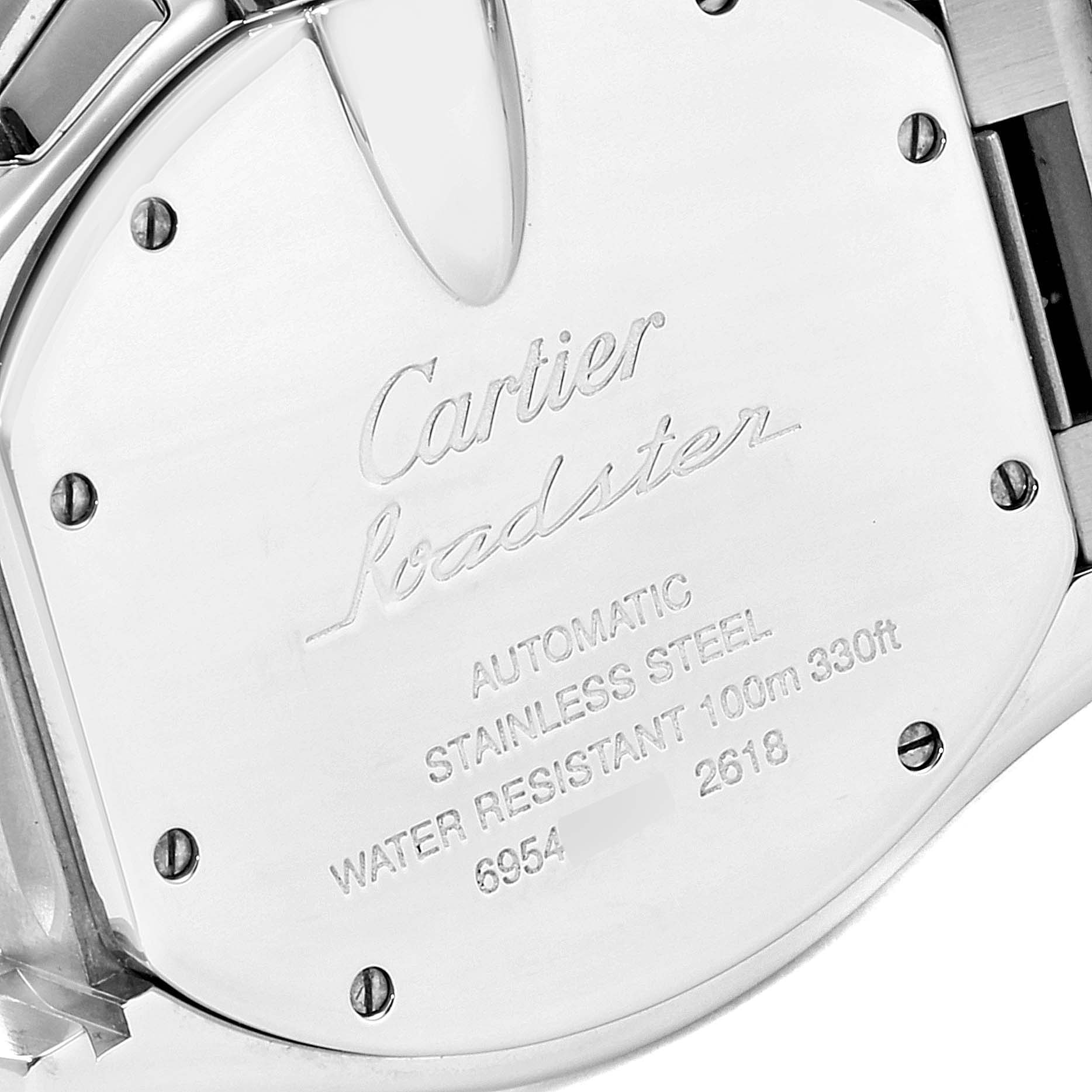 The image shows the back case of a Cartier Roadster W62019X6 Men's Stainless Steel Silver Dial W62019X6 Men's Stainless Steel Silver Dial watch, featuring engravings and screws.