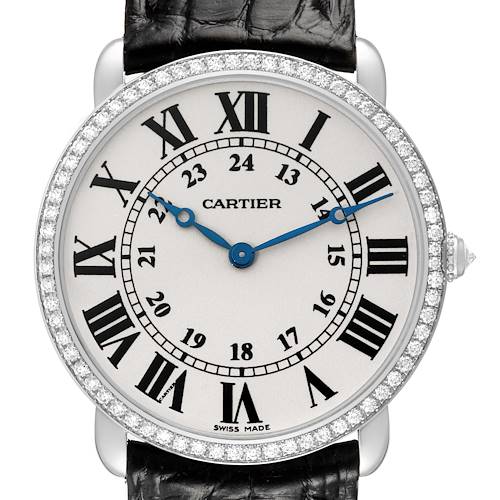 The Cartier Ronde WR000551 Women's White Gold Silver Dial watch is shown from a top-down angle, displaying the dial, Roman numerals, blue hands, and a diamond-studded bezel.