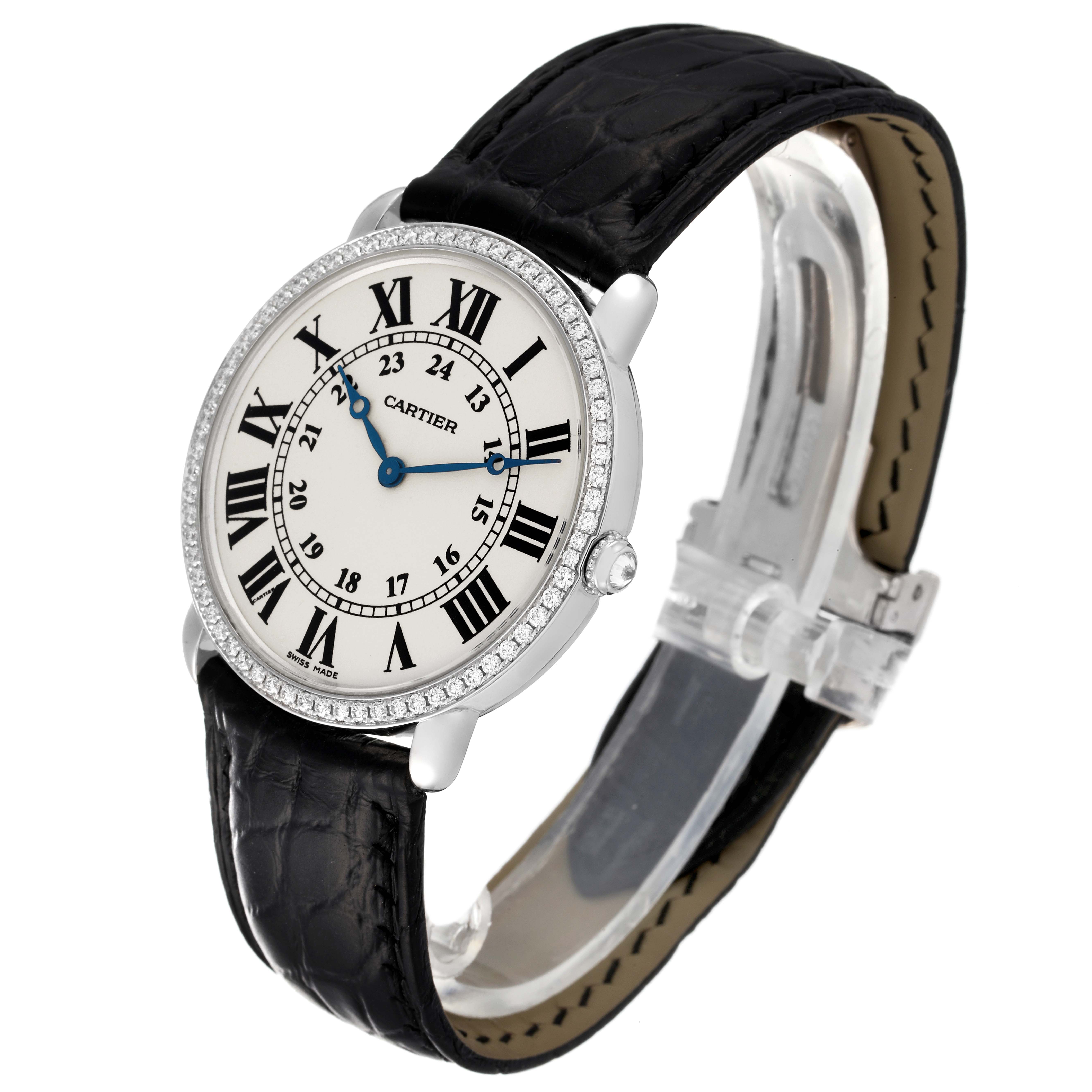 The image shows a side view of the Cartier Ronde WR000551 Men's White Gold Silver Dial WR000551 Men's White Gold Silver Dial watch, highlighting its face, black strap, and clasp.