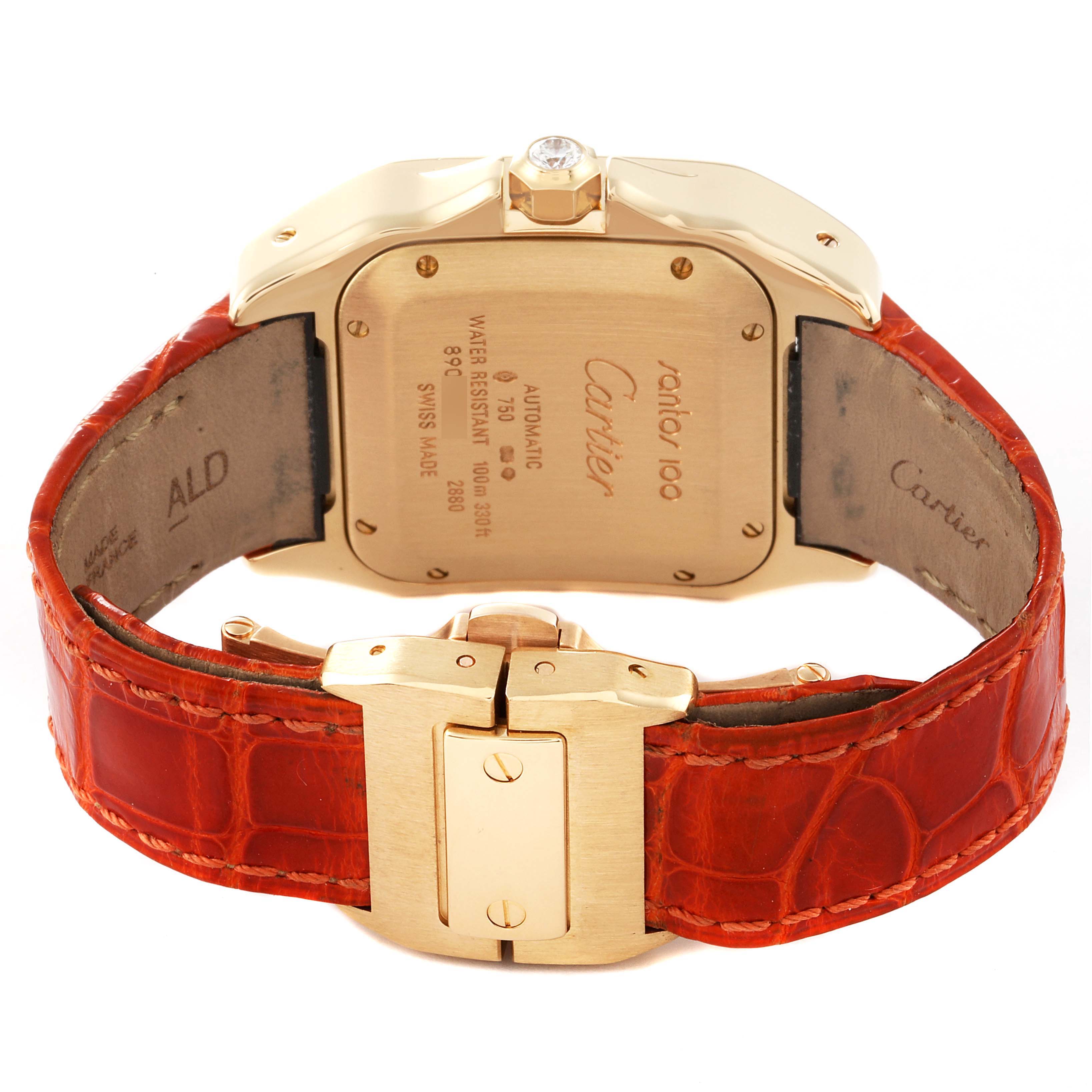 This image shows the back and clasp of a Santos de Cartier watch, highlighting the case back and red leather strap.