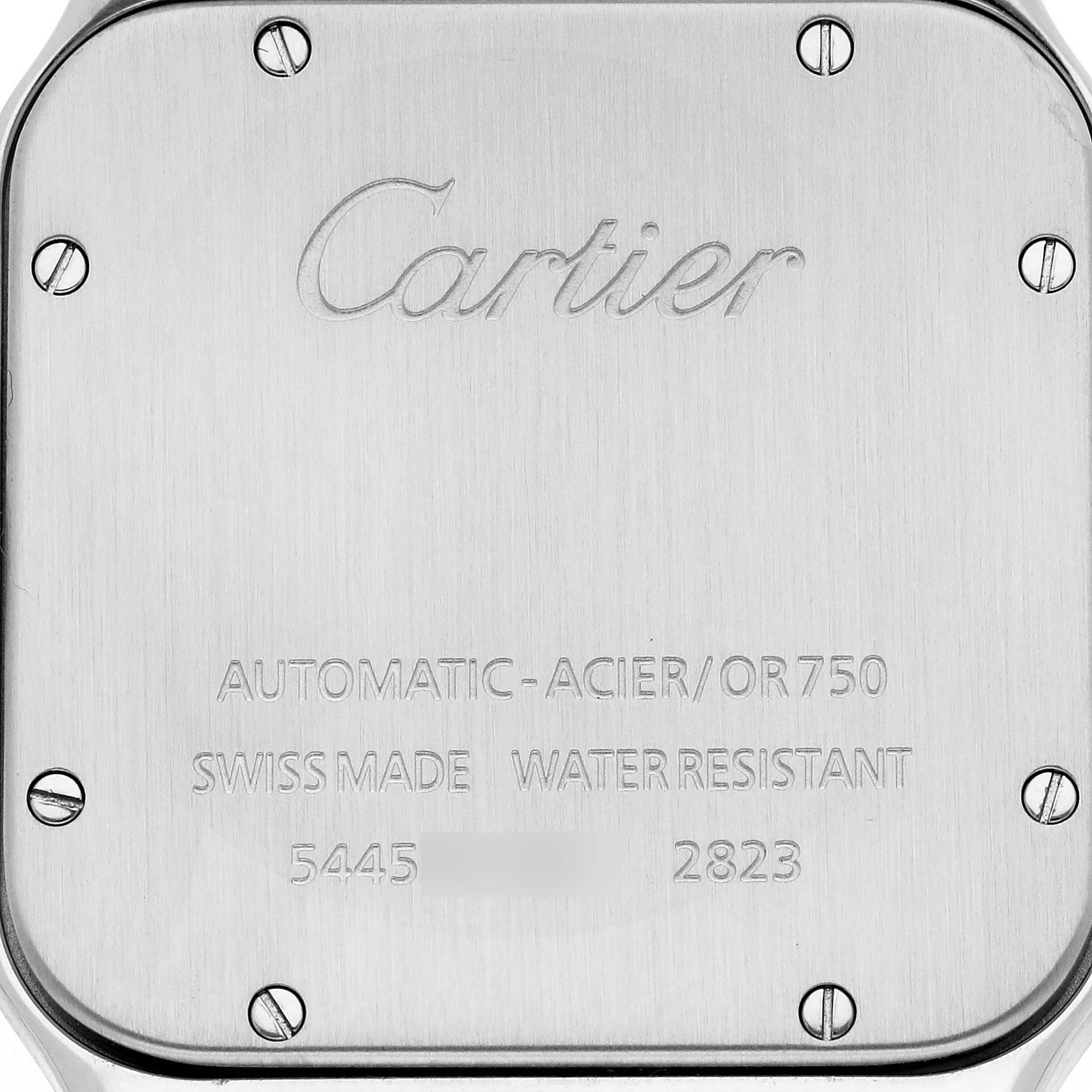 This image shows the back case of a Cartier Santos W20099C4 Men's Stainless Steel Silver Dial watch, highlighting its engravings and screws.