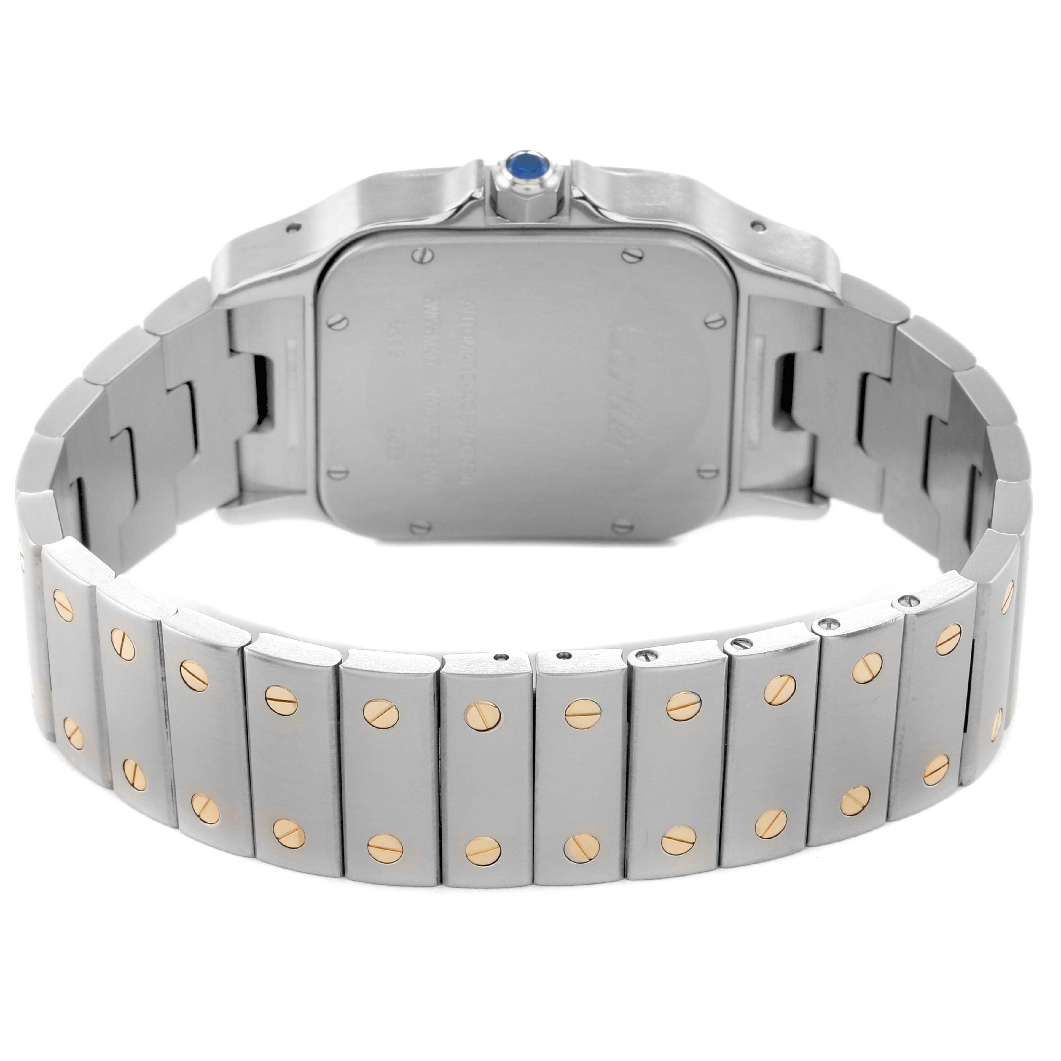 The image shows the back view of a Cartier Santos W20099C4 Men's Stainless Steel Silver Dial watch, highlighting its metal bracelet with gold screws and a blue crown.