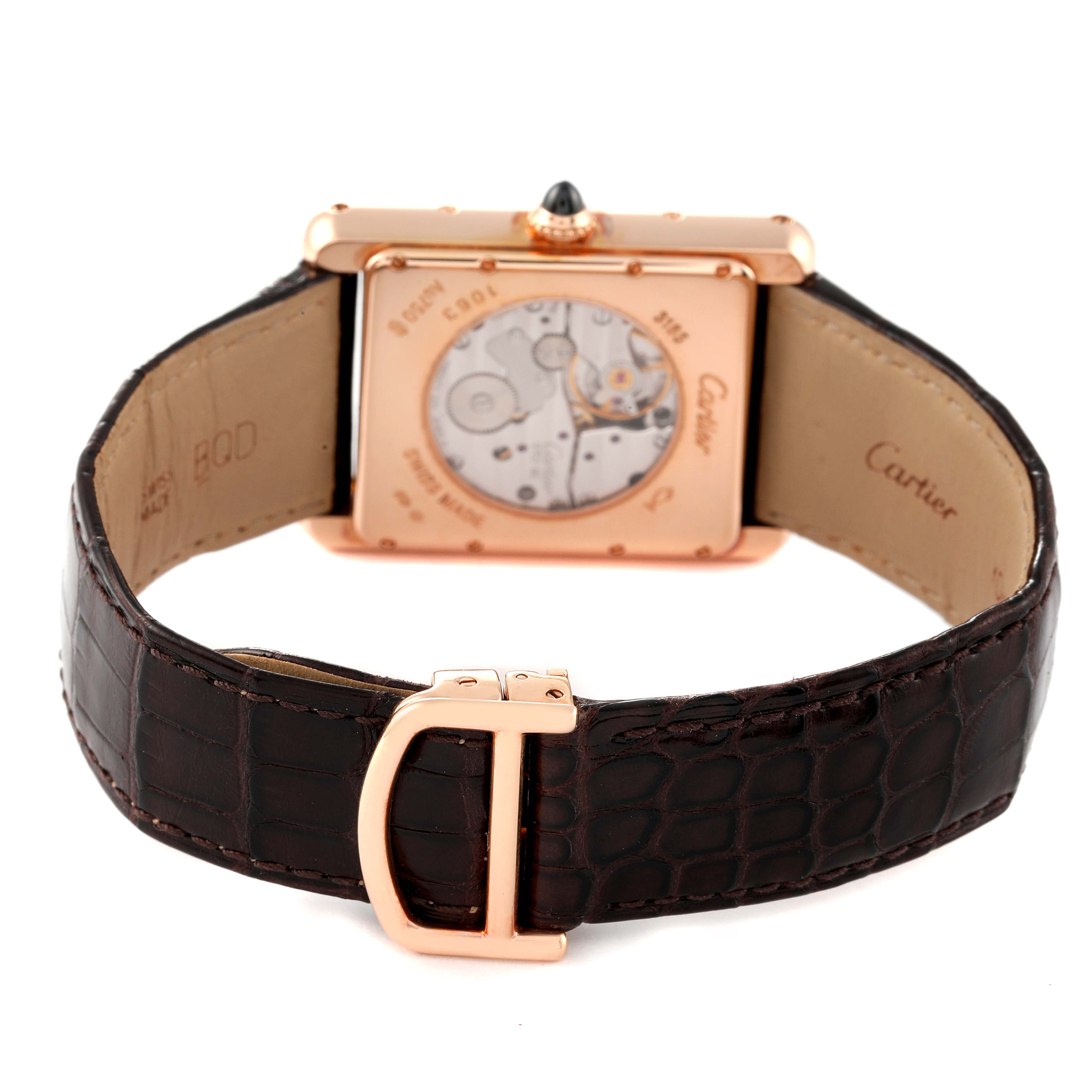 The image shows the back view of a Cartier Tank Louis W1560002 Men's Rose Gold Brown Dial W1560002 Men's Rose Gold Brown Dial watch, highlighting the leather strap and transparent case back.