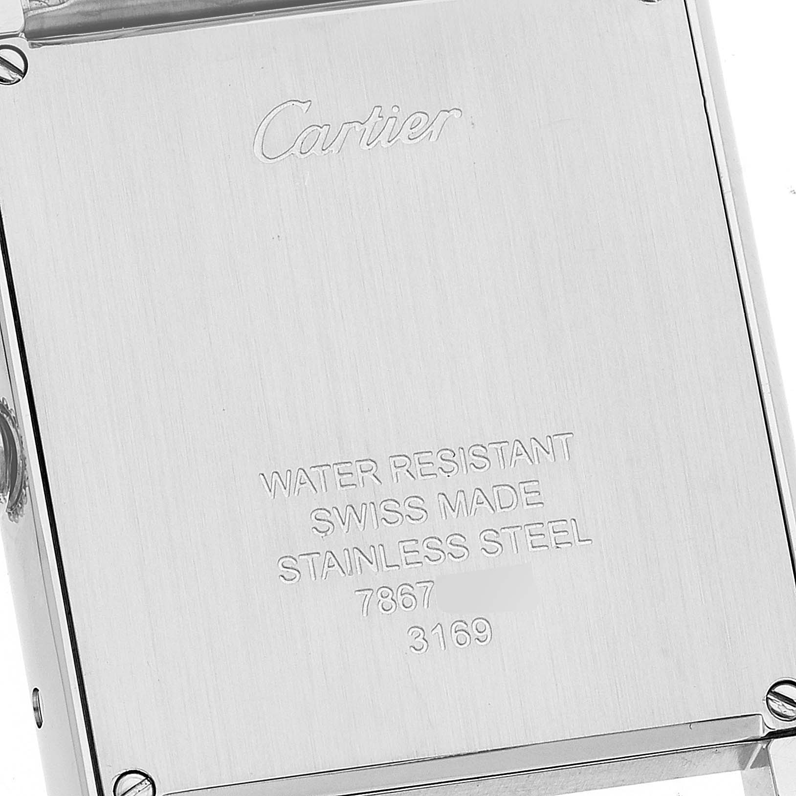 The image shows the back of the Cartier Tank Solo W5200014 Men
s Stainless Steel Silver Dial W5200014 Men
s Stainless Steel Silver Dial watch, highlighting the brand name and watch specifications.
