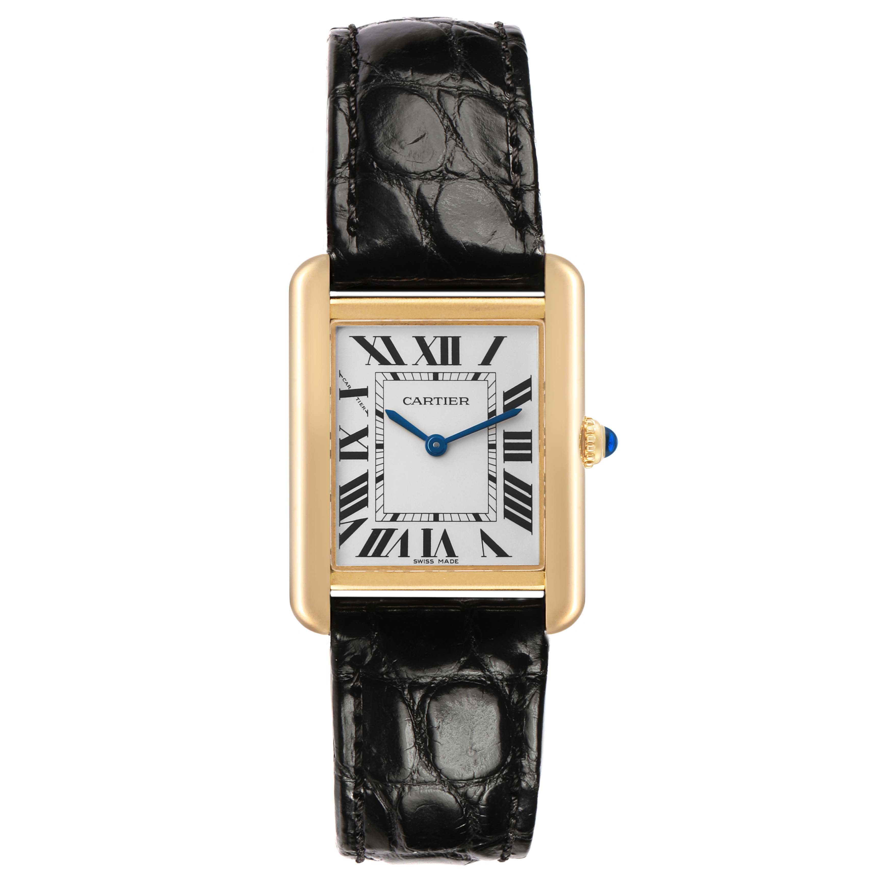 The Cartier Tank Solo W5200002 Women's Steel and Gold (two tone) Silver Dial watch is shown from the front, featuring its face, Roman numerals, gold casing, and black leather strap.