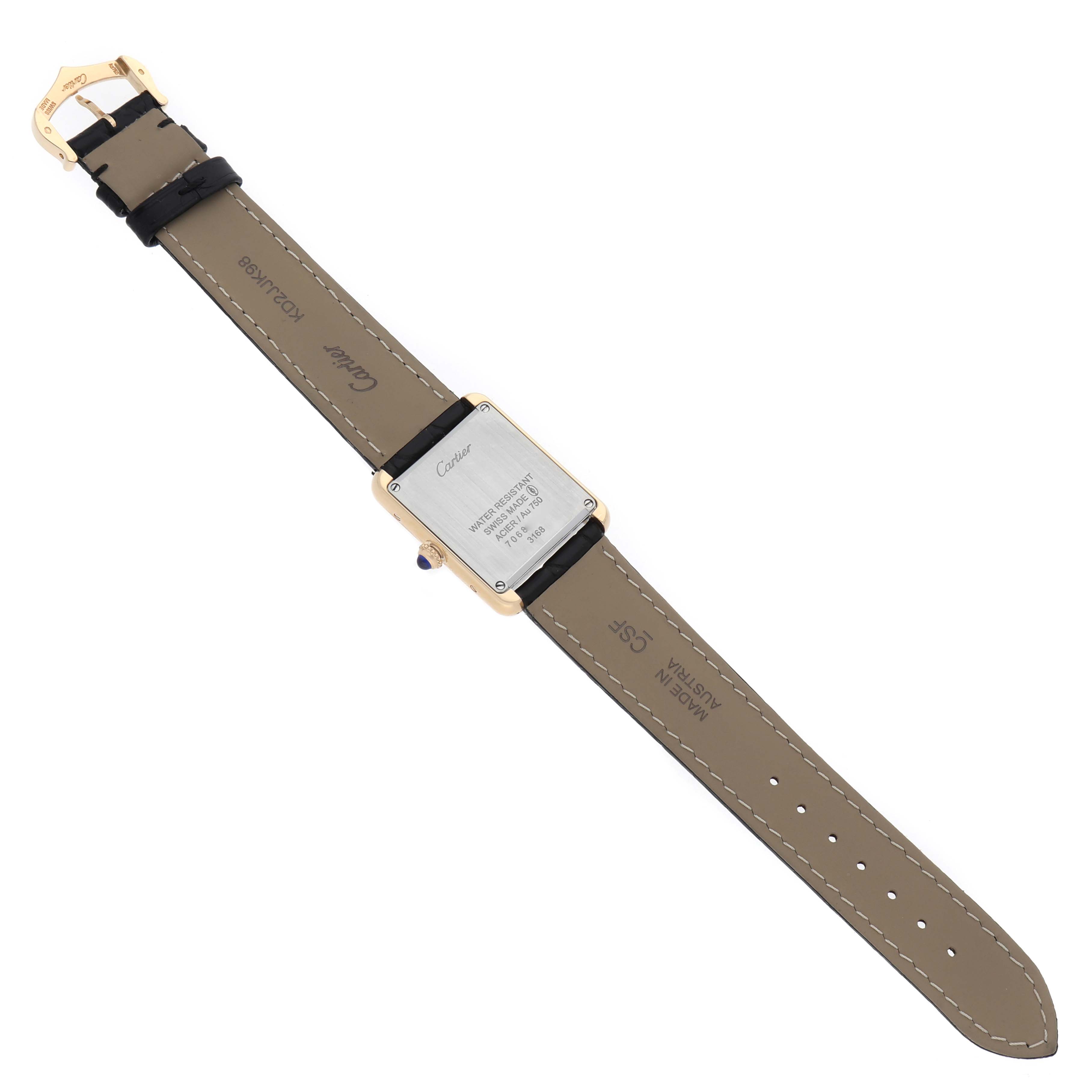 The Cartier Tank Solo W5200002 Women's Steel and Gold (two tone) Silver Dial watch is shown from the back, displaying the case back, straps, and buckle.