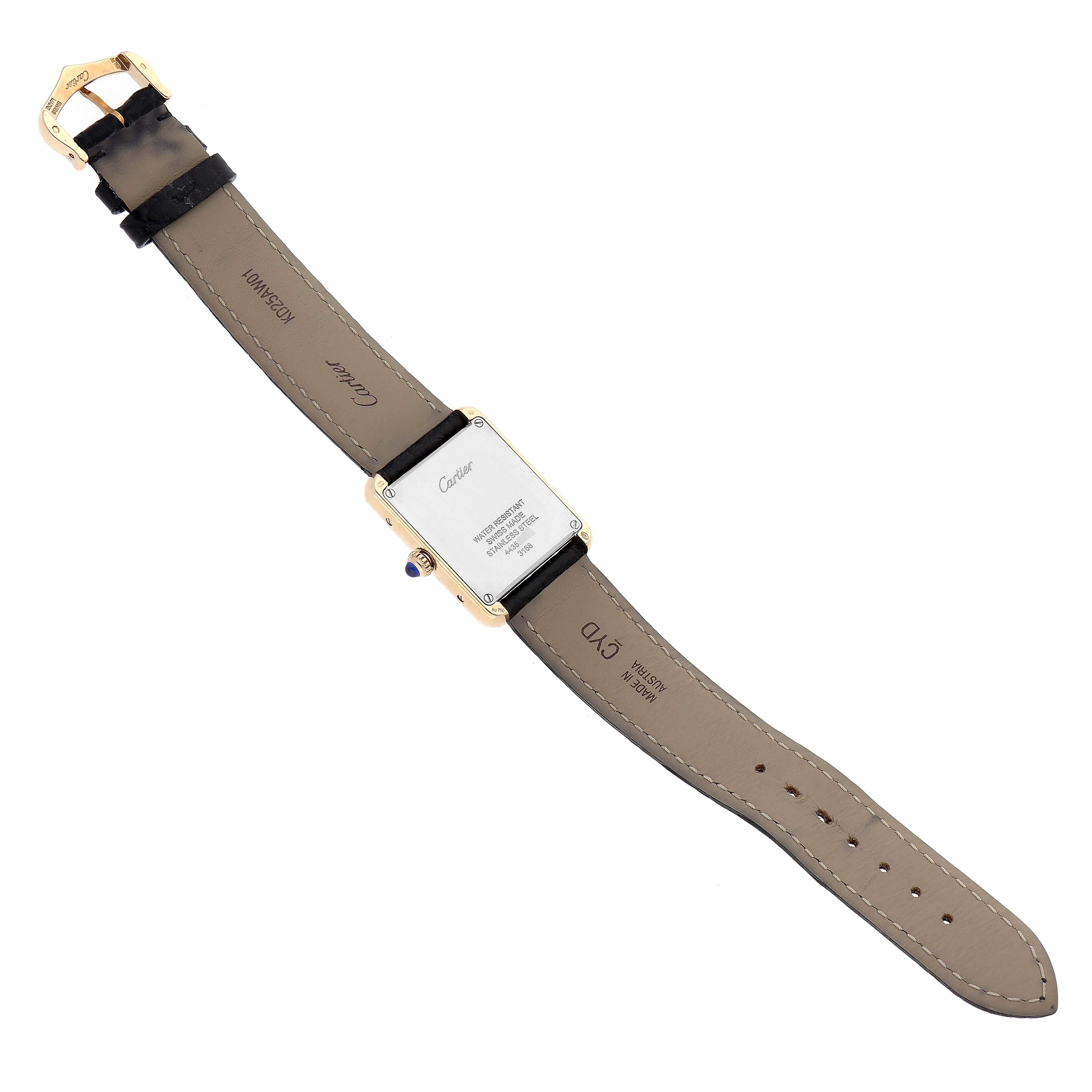 The Cartier Tank Solo W5200002 Women's Steel and Gold (two tone) Silver Dial watch is shown from the back, featuring its case, strap, buckle, and crown.