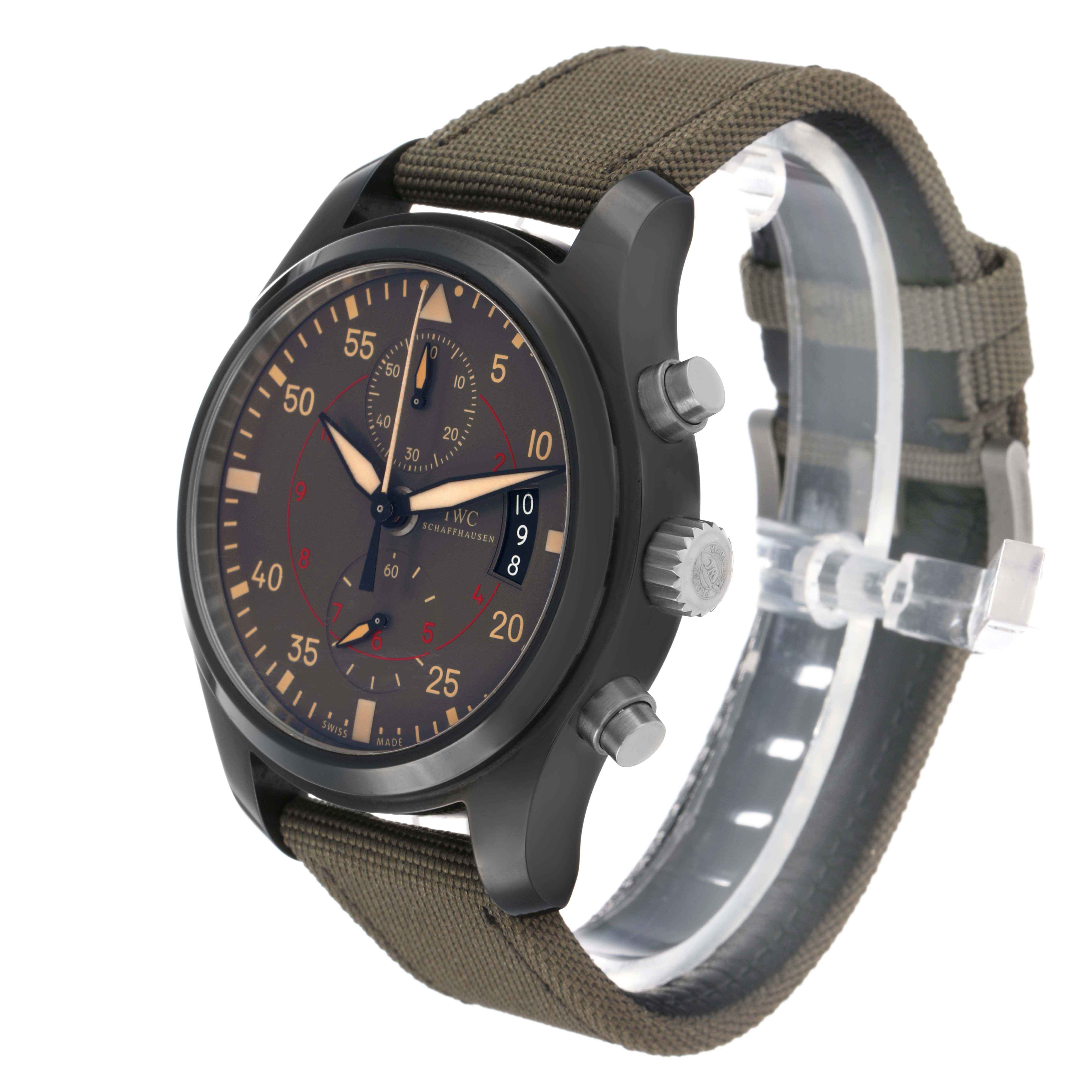 The IWC Pilot IW388002 Men's Ceramic Grey Dial watch is shown at a three-quarter angle, displaying the face, case, crown, pushers, and fabric strap.