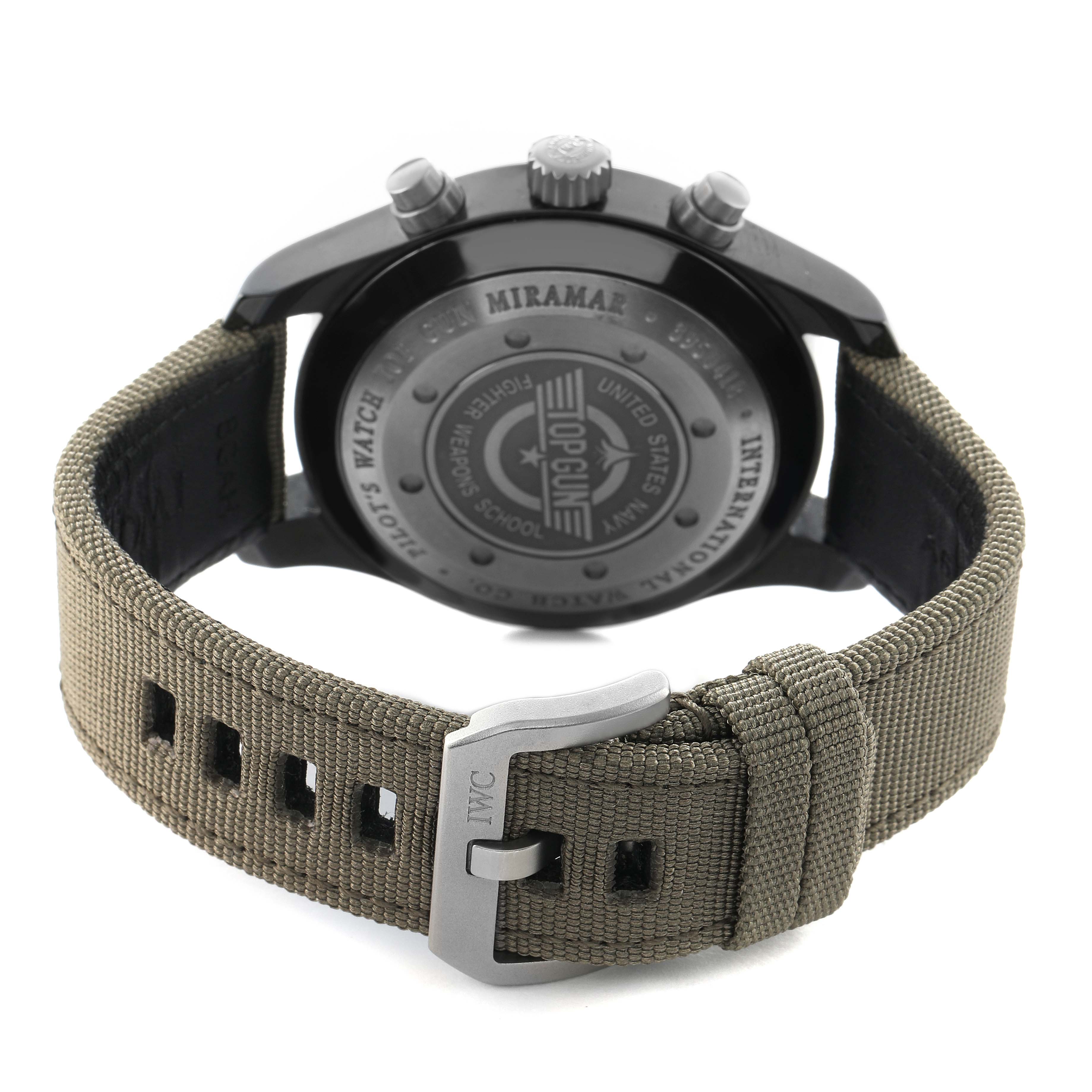 The image shows the back of the IWC Pilot IW388002 Men's Ceramic Grey Dial watch, highlighting the engraved case back and fabric strap with a clasp.