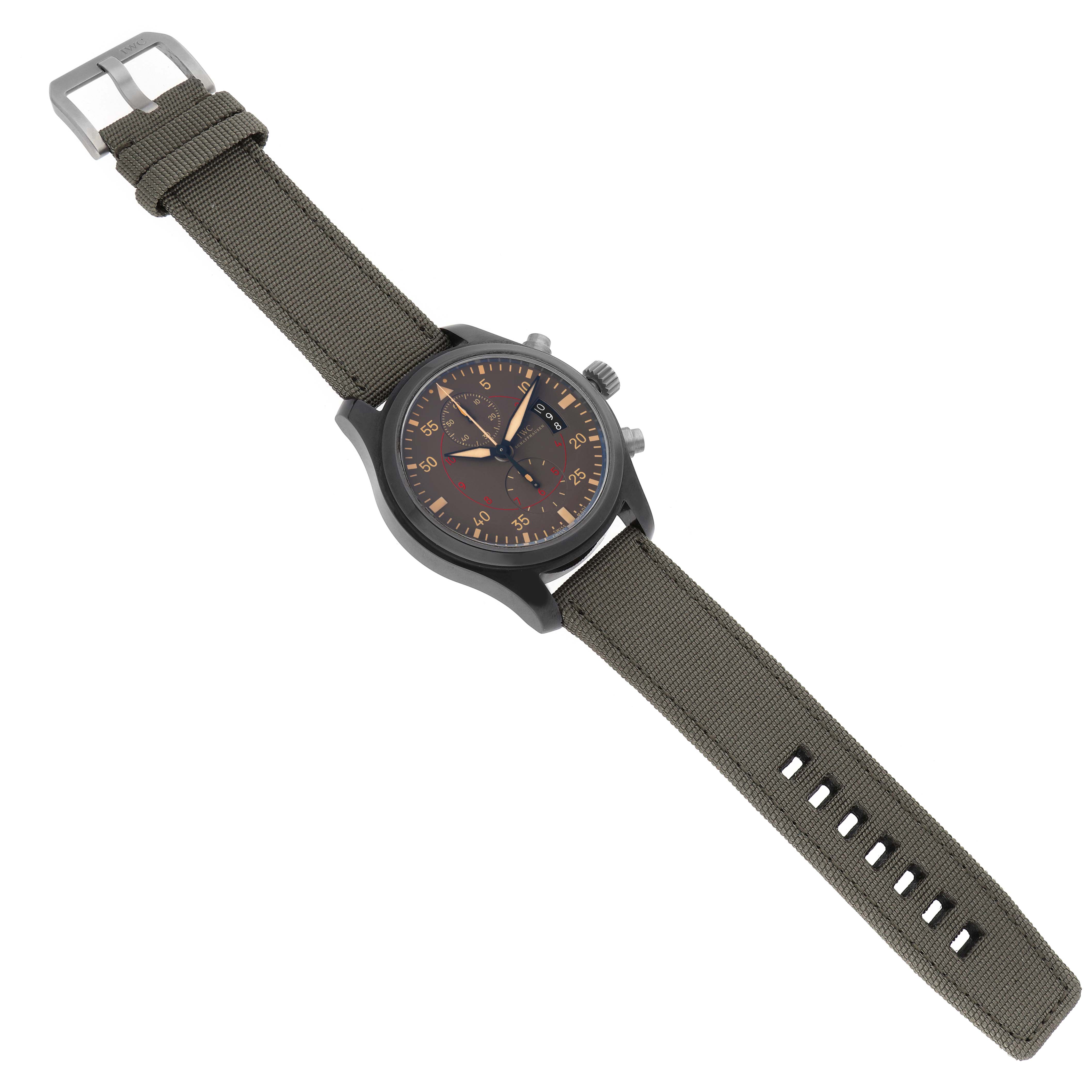 The IWC Pilot IW388002 Men's Ceramic Grey Dial watch is shown from a top-down angle, with a full view of the face, case, and fabric strap.