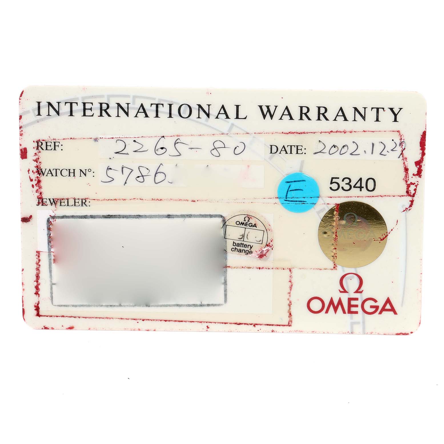This image shows the international warranty card for an Omega Seamaster 2265.80.00 Men's Stainless Steel Blue Dial 2265.80.00 Men's Stainless Steel Blue Dial watch, displaying reference and watch numbers, date, and jeweler details.