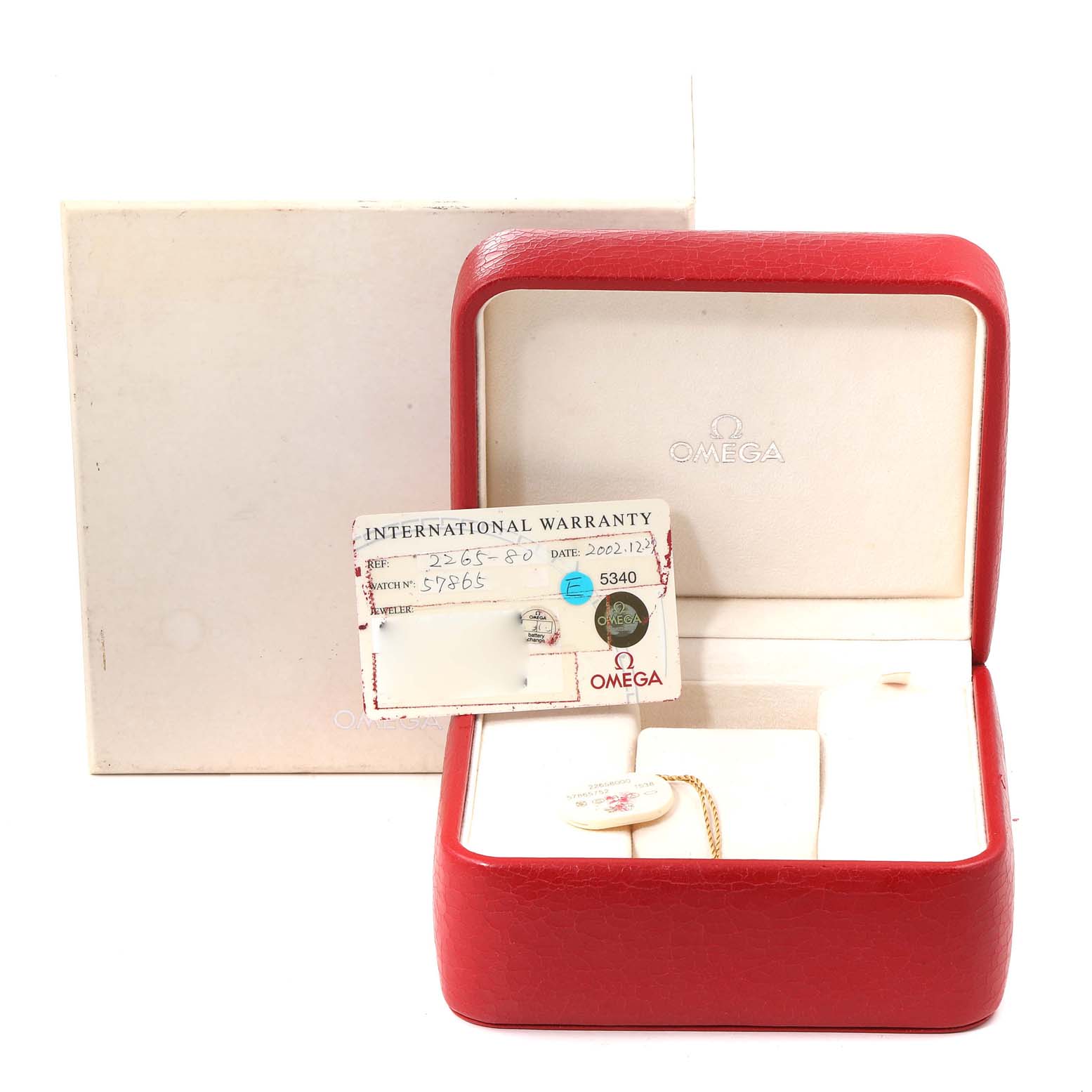 The image shows the box, warranty card, and tag of an Omega Seamaster 2265.80.00 Men's Stainless Steel Blue Dial 2265.80.00 Men's Stainless Steel Blue Dial watch from a frontal angle.