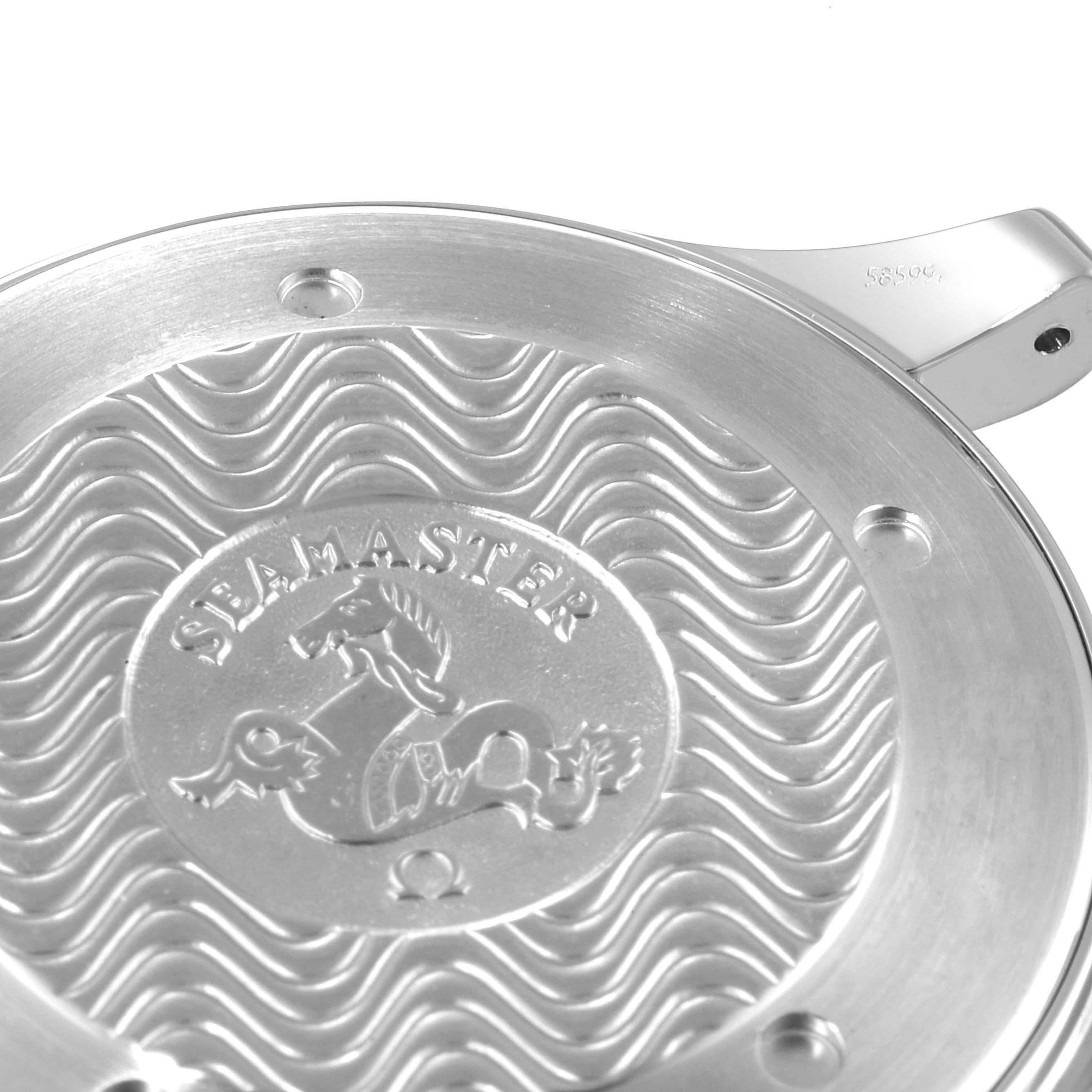 This image shows the back case of the Omega Seamaster 2265.80.00 Men's Stainless Steel Blue Dial 2265.80.00 Men's Stainless Steel Blue Dial watch with the engraved logo and wave design.