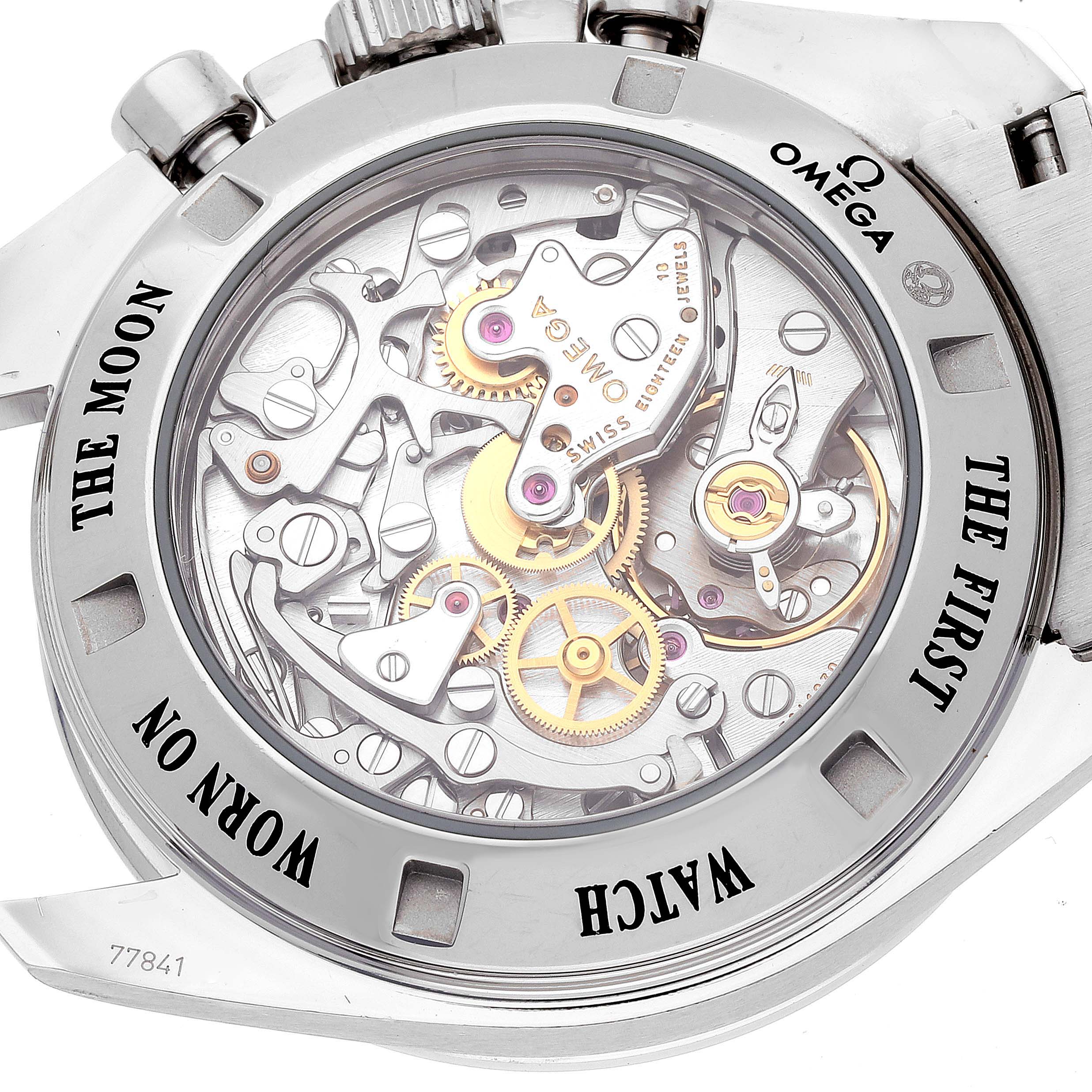 The image shows the back view of an Omega Speedmaster 311.30.42.30.01.006 Men's Stainless Steel Black Dial 311.30.42.30.01.006 Men's Stainless Steel Black Dial watch, highlighting its exposed mechanical movement.