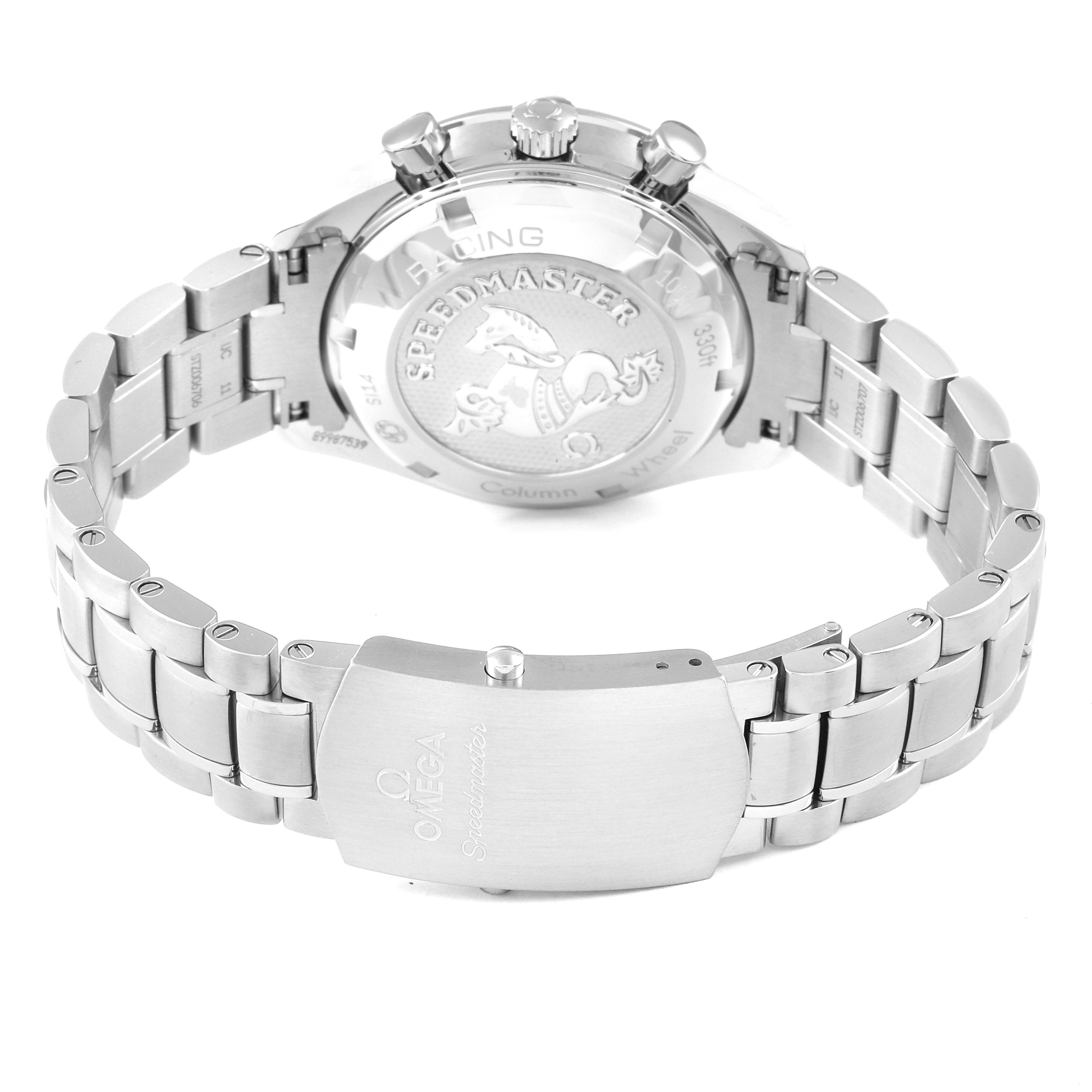 The image shows the back case and bracelet of the Omega Speedmaster 326.30.40.50.03.001 Men
s Stainless Steel Blue Dial 326.30.40.50.03.001 Men
s Stainless Steel Blue Dial watch, focusing on the clasp and the engraved case back.