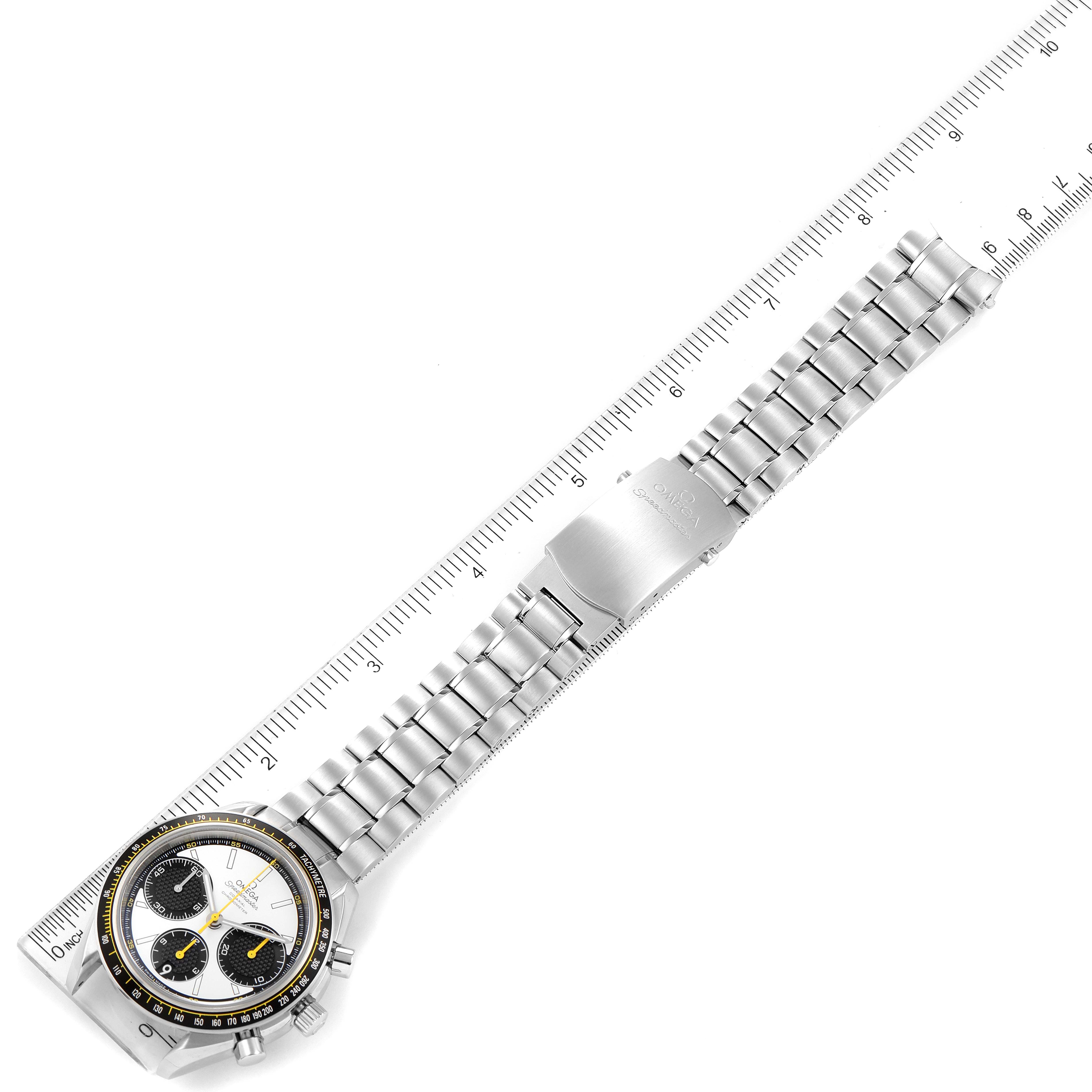 A top-down view of the Omega Speedmaster 326.30.40.50.04.001 Men's Stainless Steel White Dial 326.30.40.50.04.001 Men's Stainless Steel White Dial watch showing the full bracelet, clasp, bezel, and dial, with a ruler for scale.