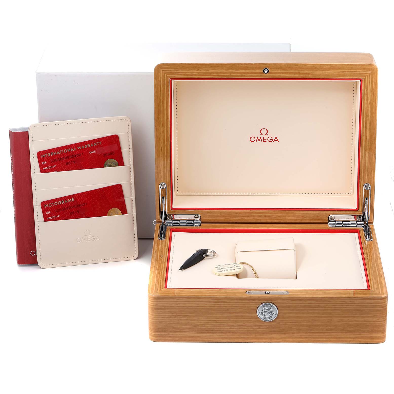 The image shows the accessories of an Omega Speedmaster 326.30.40.50.04.001 Men's Stainless Steel White Dial 326.30.40.50.04.001 Men's Stainless Steel White Dial, including the warranty cards, a case, and a presentation box.