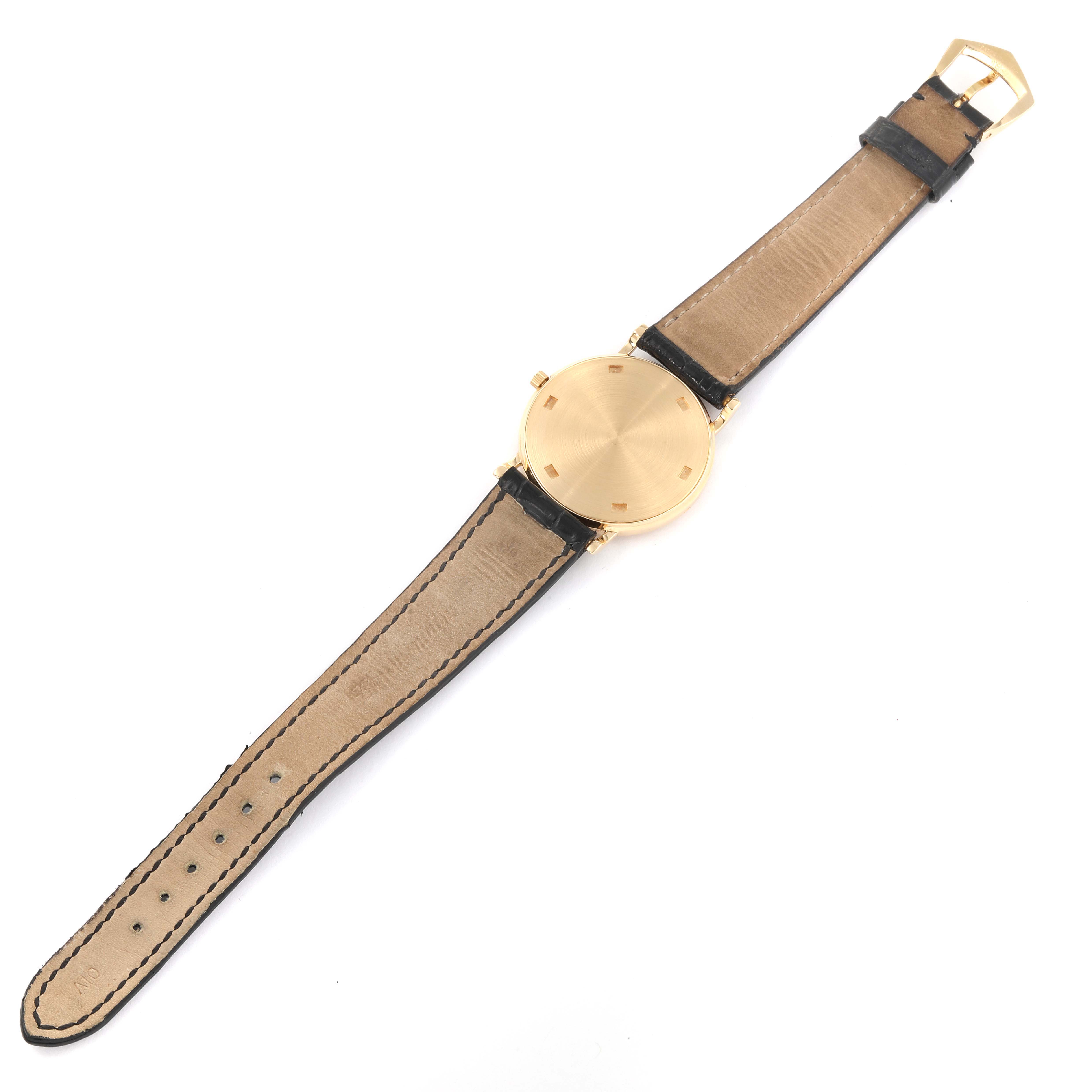 The image shows the back view of a Patek Philippe Calatrava 3520 Men's Yellow Gold White Dial 3520 Men's Yellow Gold White Dial watch, including the case back and leather strap.