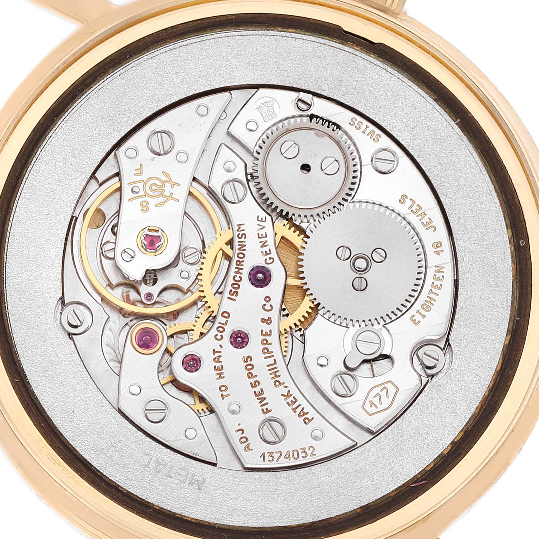 The image shows the inner mechanisms and movement components of a Patek Philippe Calatrava 3520 Men's Yellow Gold White Dial 3520 Men's Yellow Gold White Dial watch.