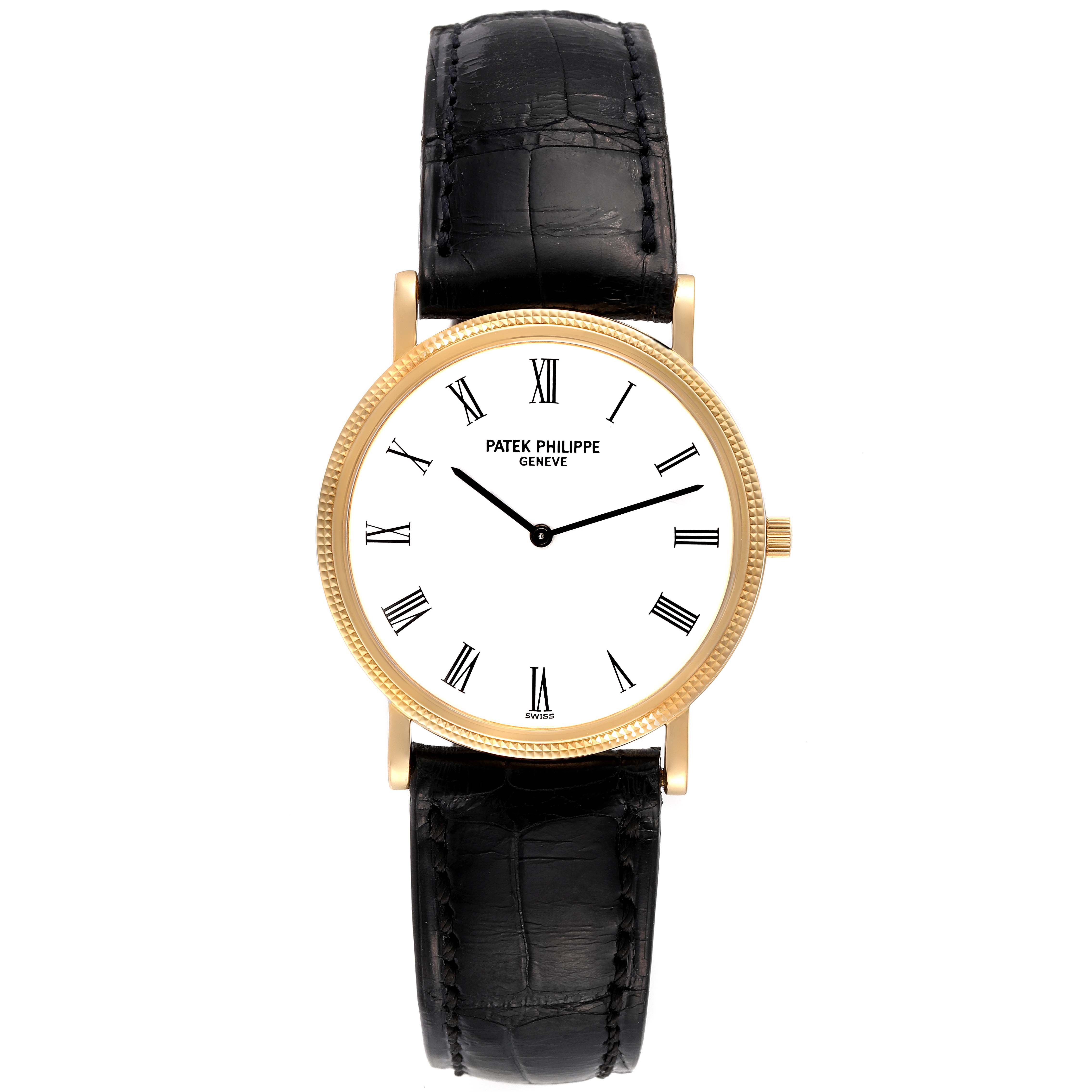 The image shows a front view of a Patek Philippe Calatrava 3520 Men's Yellow Gold White Dial 3520 Men's Yellow Gold White Dial watch, featuring its dial, case, and strap.
