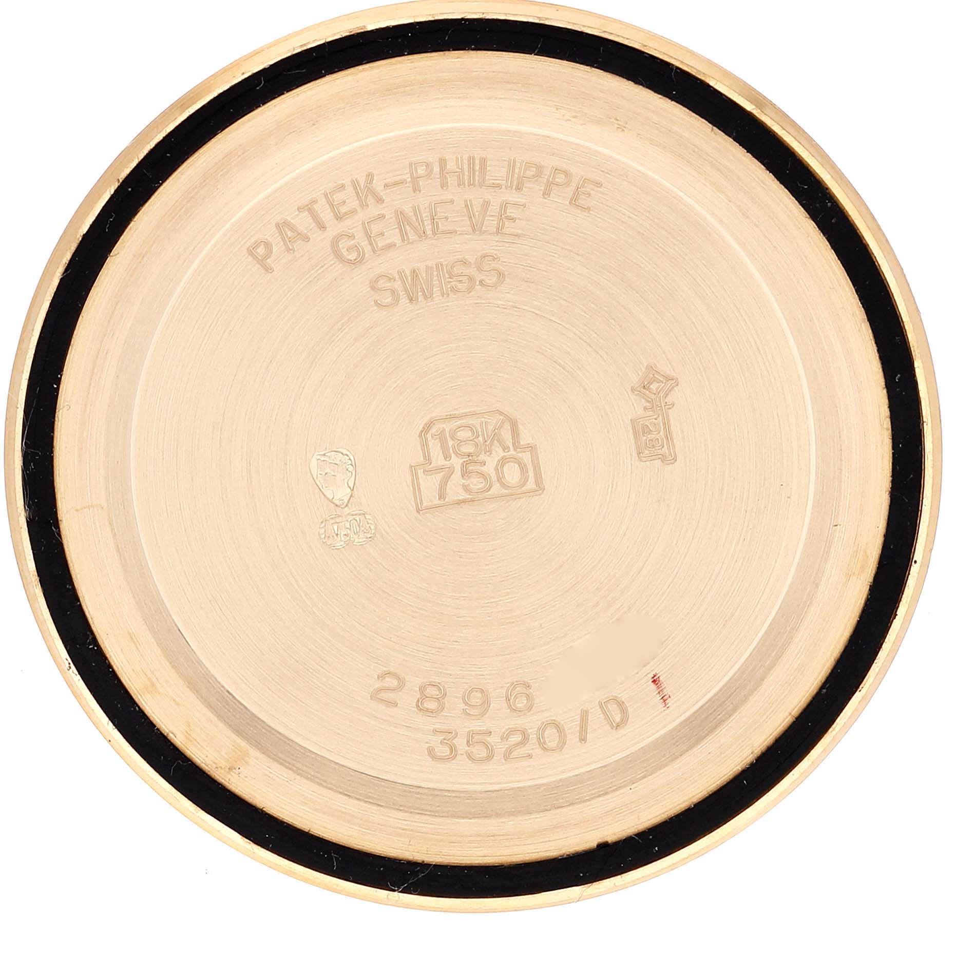 This image shows the inside of the case back of a Patek Philippe Calatrava 3520 Men's Yellow Gold White Dial 3520 Men's Yellow Gold White Dial watch, with model and hallmark engravings visible.