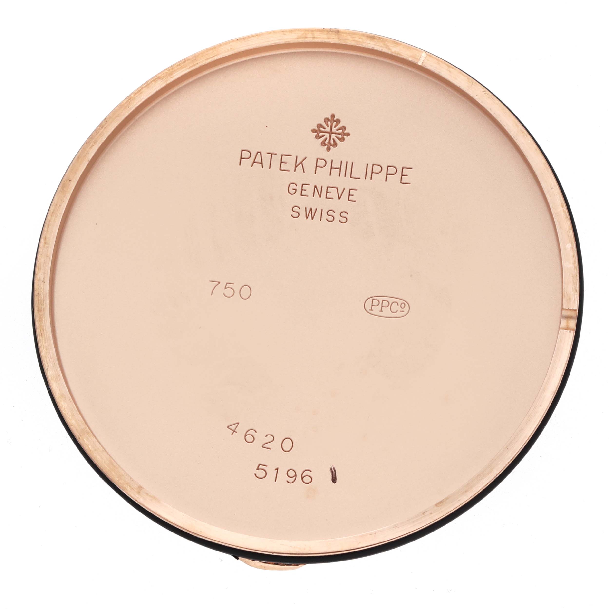 The image shows the inside of the case back of a Patek Philippe Calatrava 5196R Men's Rose Gold Grey Dial watch, highlighting brand markings and model numbers.