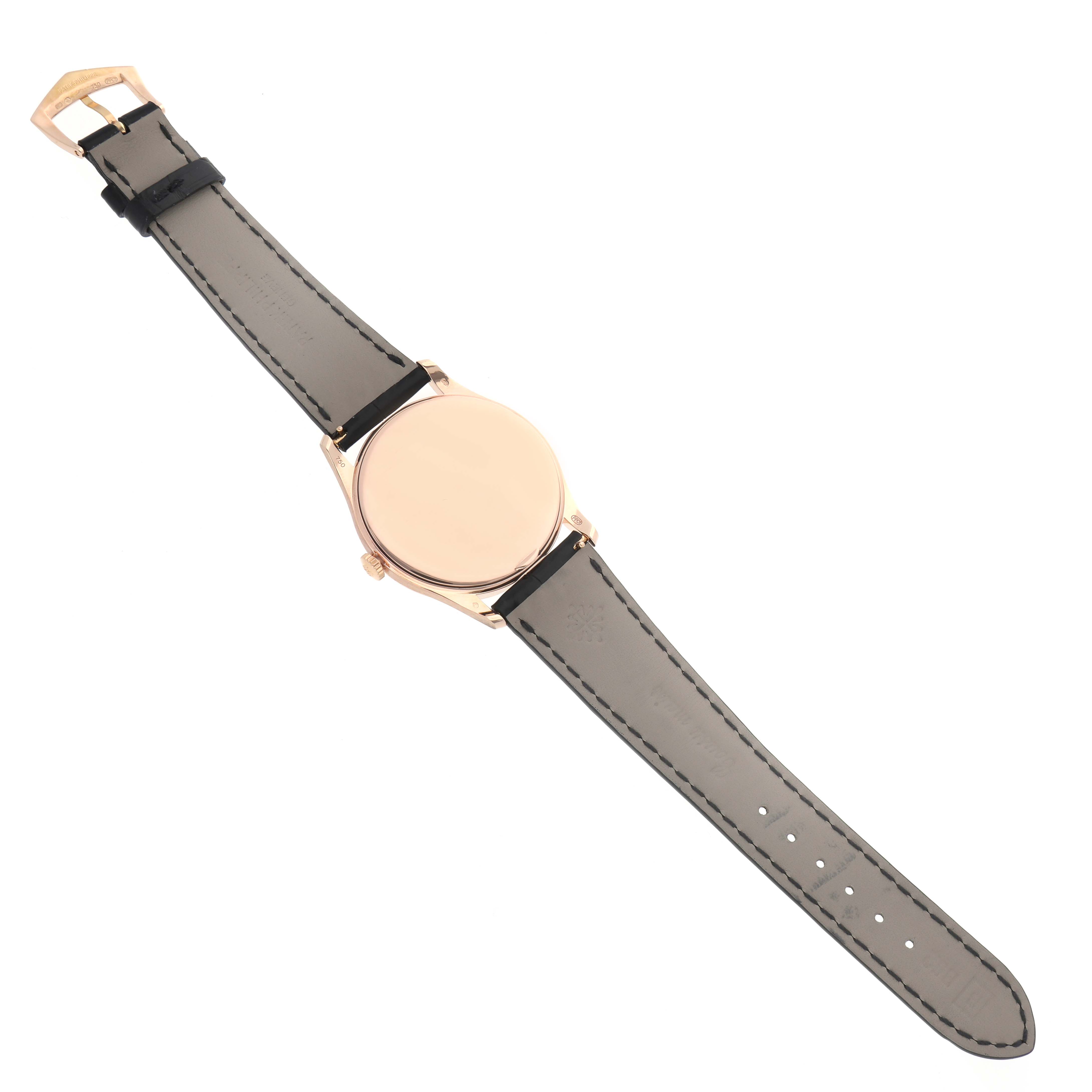 The Patek Philippe Calatrava 5196R Men's Rose Gold Grey Dial watch is shown from the back, displaying its strap, case back, and buckle.