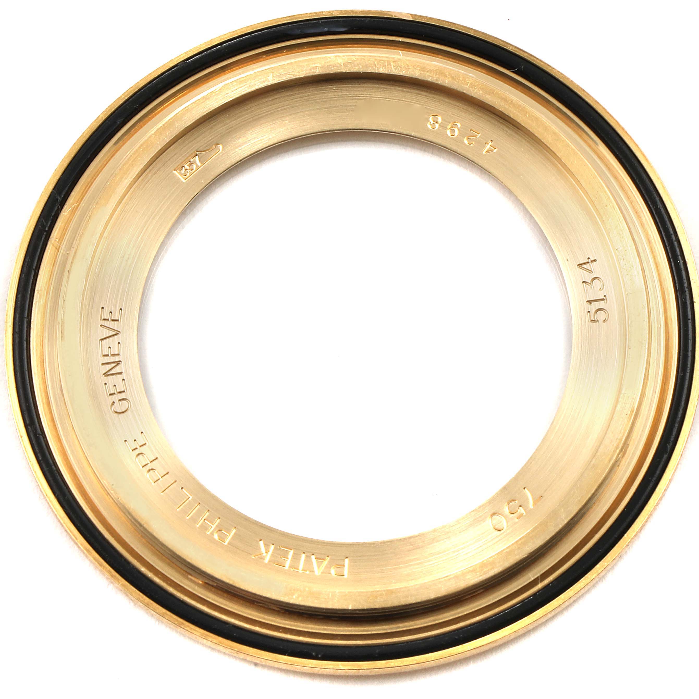 This image shows a close-up of the bezel for the Patek Philippe Calatrava 5134J Men
s Yellow Gold White Dial 5134J Men
s Yellow Gold White Dial model 5134.