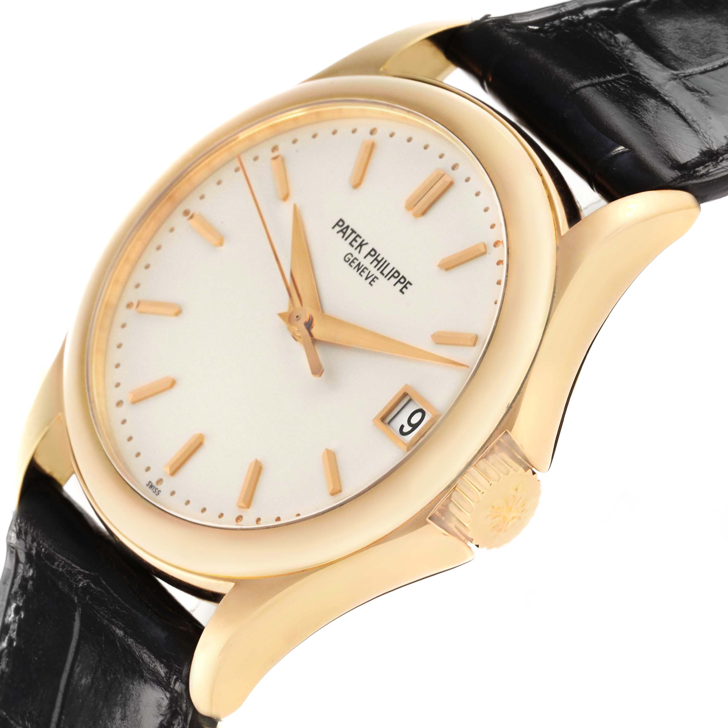 The image shows a Patek Philippe Calatrava 5107J Men's Yellow Gold Silver Dial watch from a three-quarter angle, highlighting the dial, crown, and part of the leather strap.